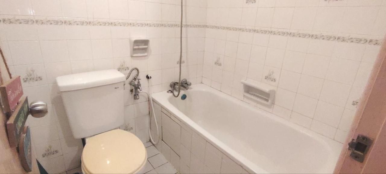 Three-Bedroom Apartment with Balcony