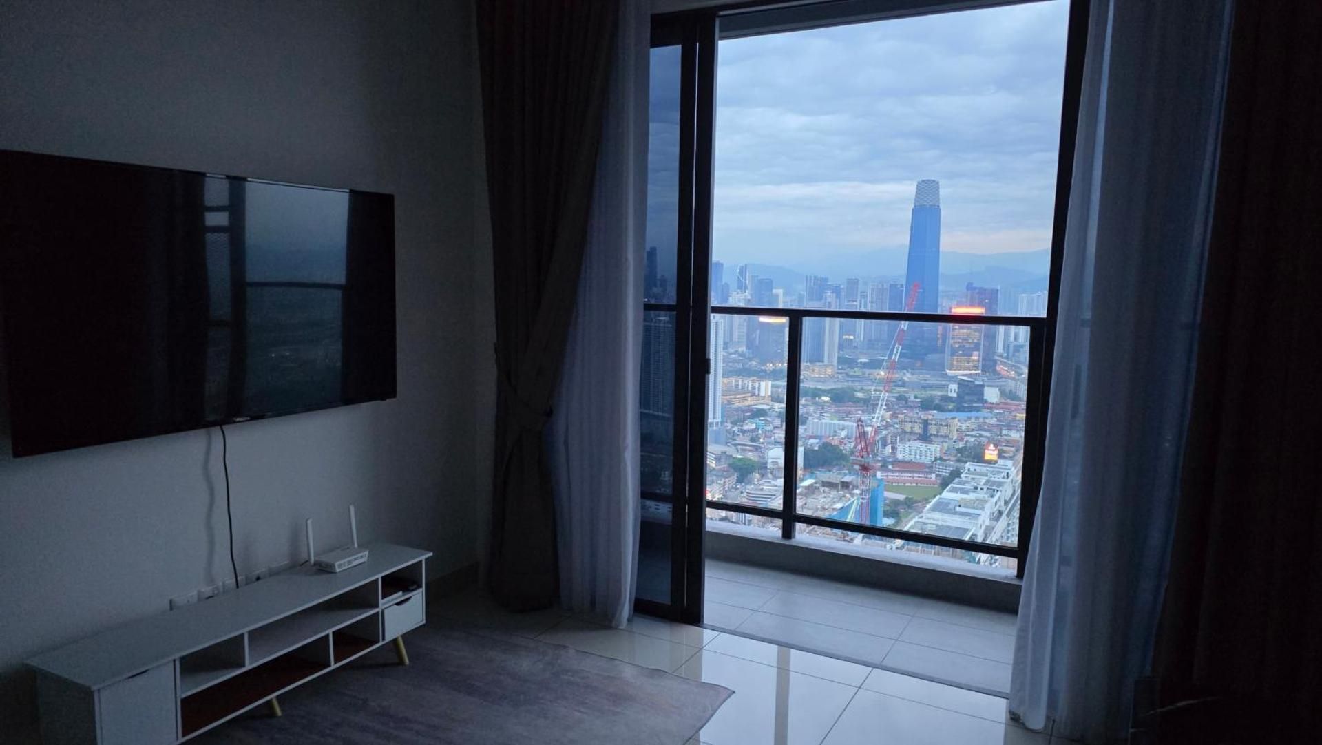 One-Bedroom Apartment with Balcony and City View