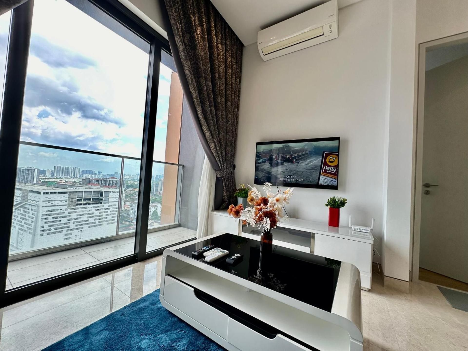 One-Bedroom Apartment with Balcony and City View