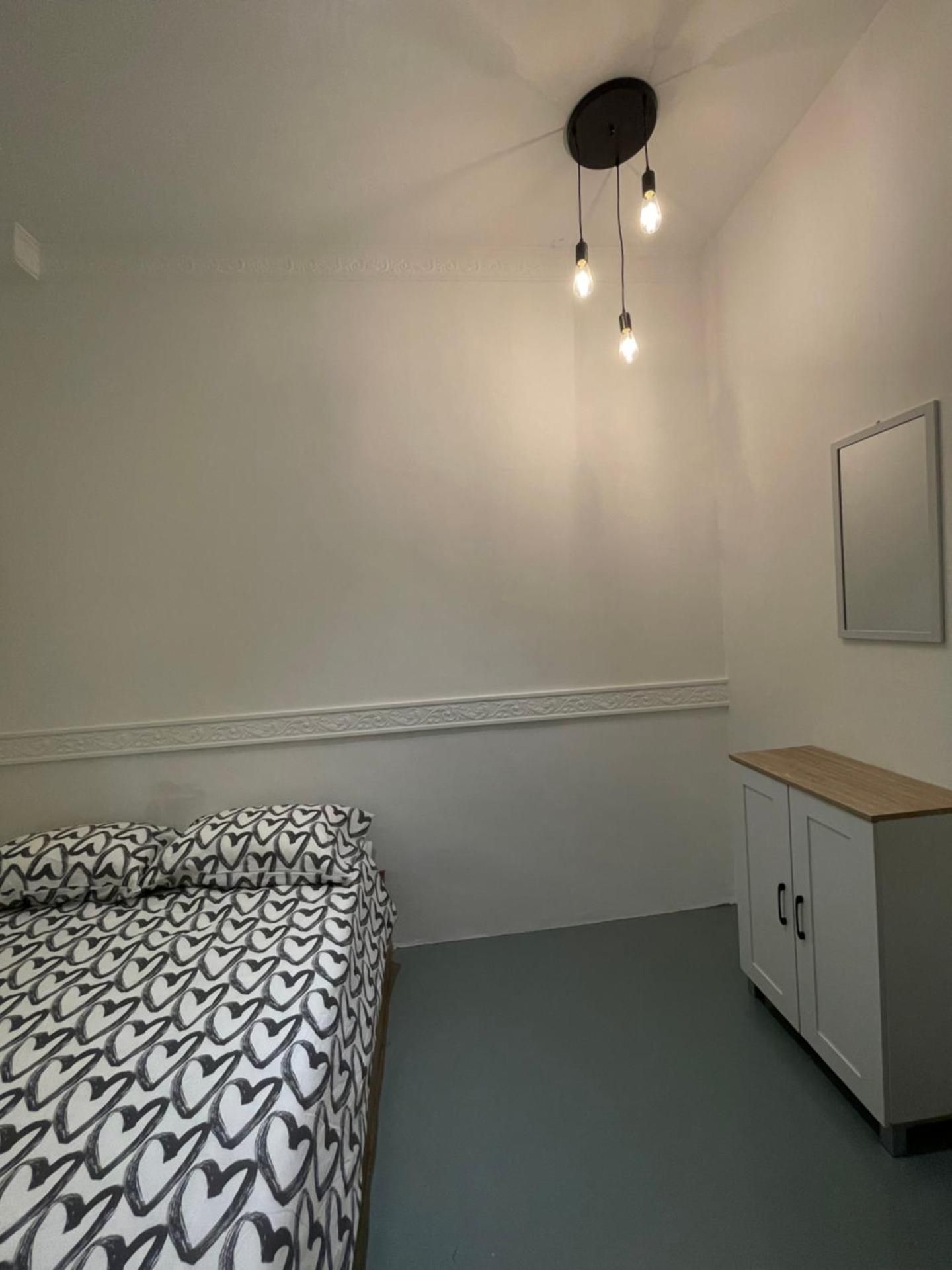 Queen Room with Shared Bathroom