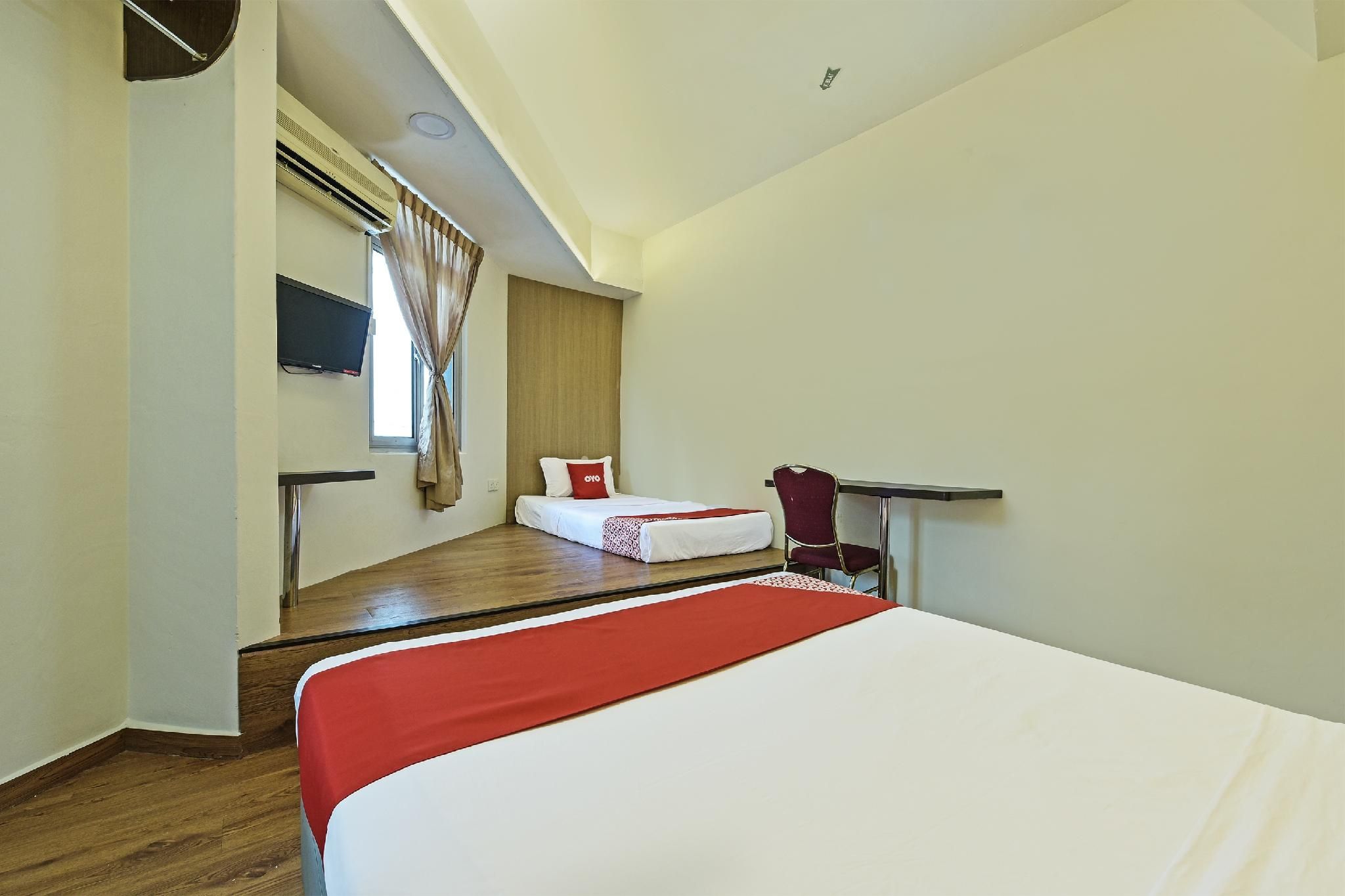 Hotel O De Perdana Hill Suite Triple Room 2