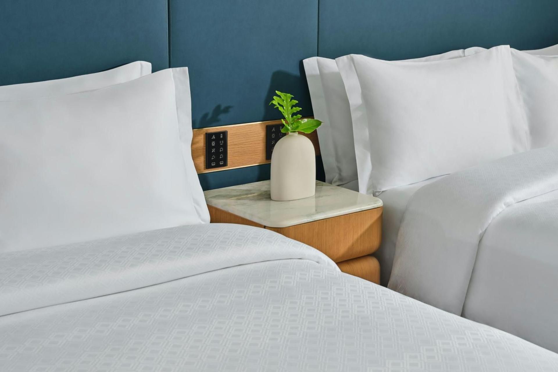 Deluxe Queen Room with Two Queen Beds and Poolside