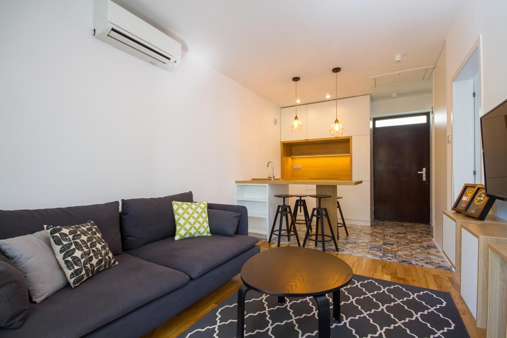 Two-Bedroom Apartment with Balcony and Garden View