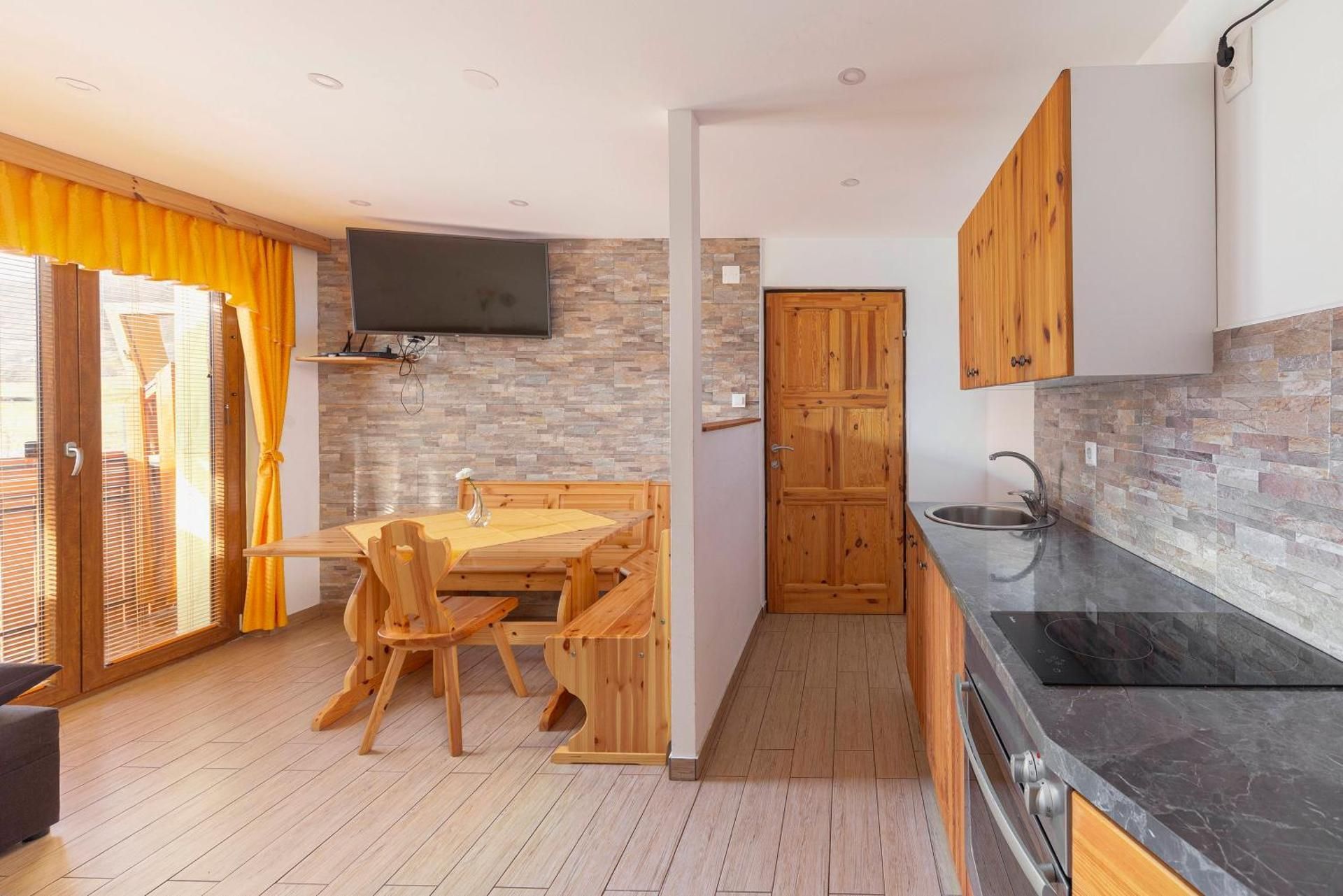 Two-Bedroom Apartment with Balcony and Garden View