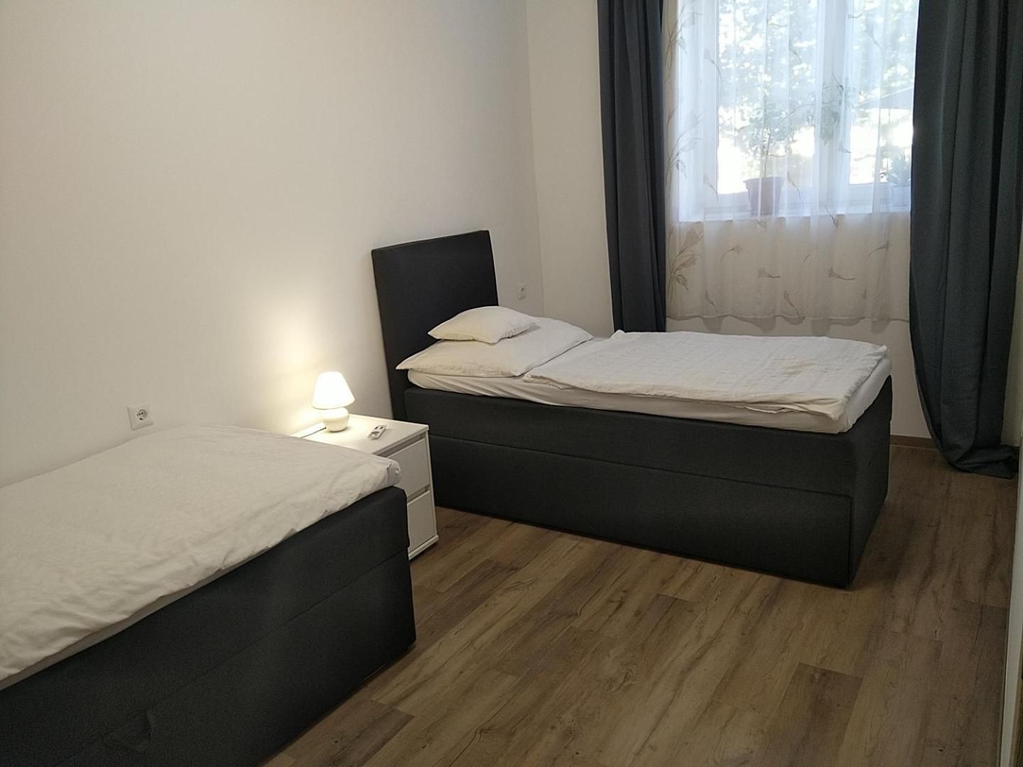 Deluxe Two-Bedroom Apartment with Garden View