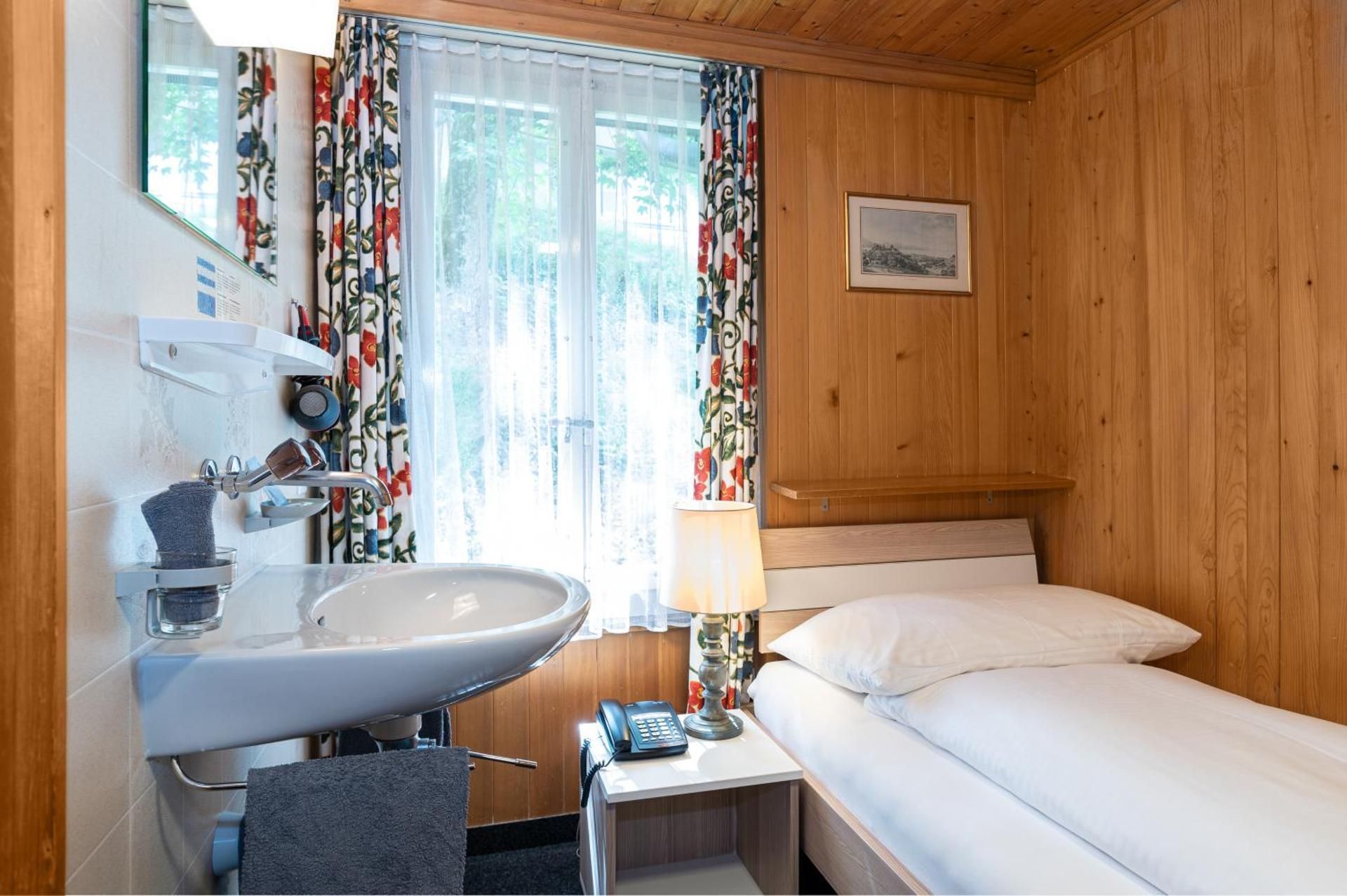 Basic Plus Single Room with Shared Shower and Toilet