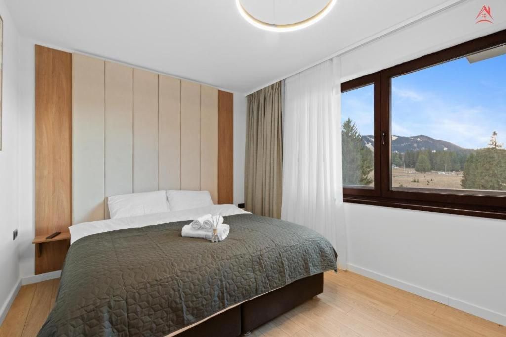 One-Bedroom Apartment with Balcony and Mountain View  