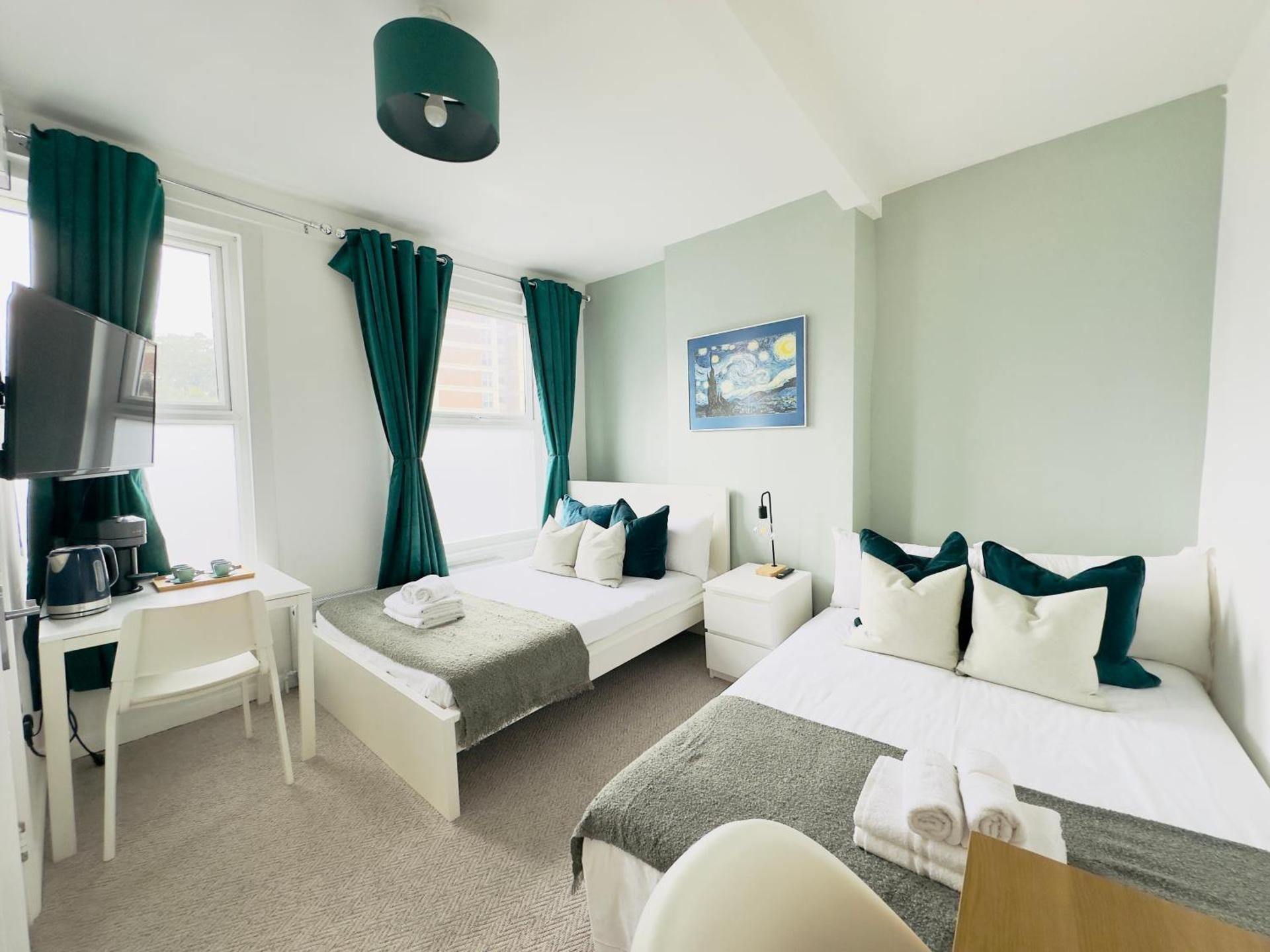 Quadruple Room with Private Bathroom
