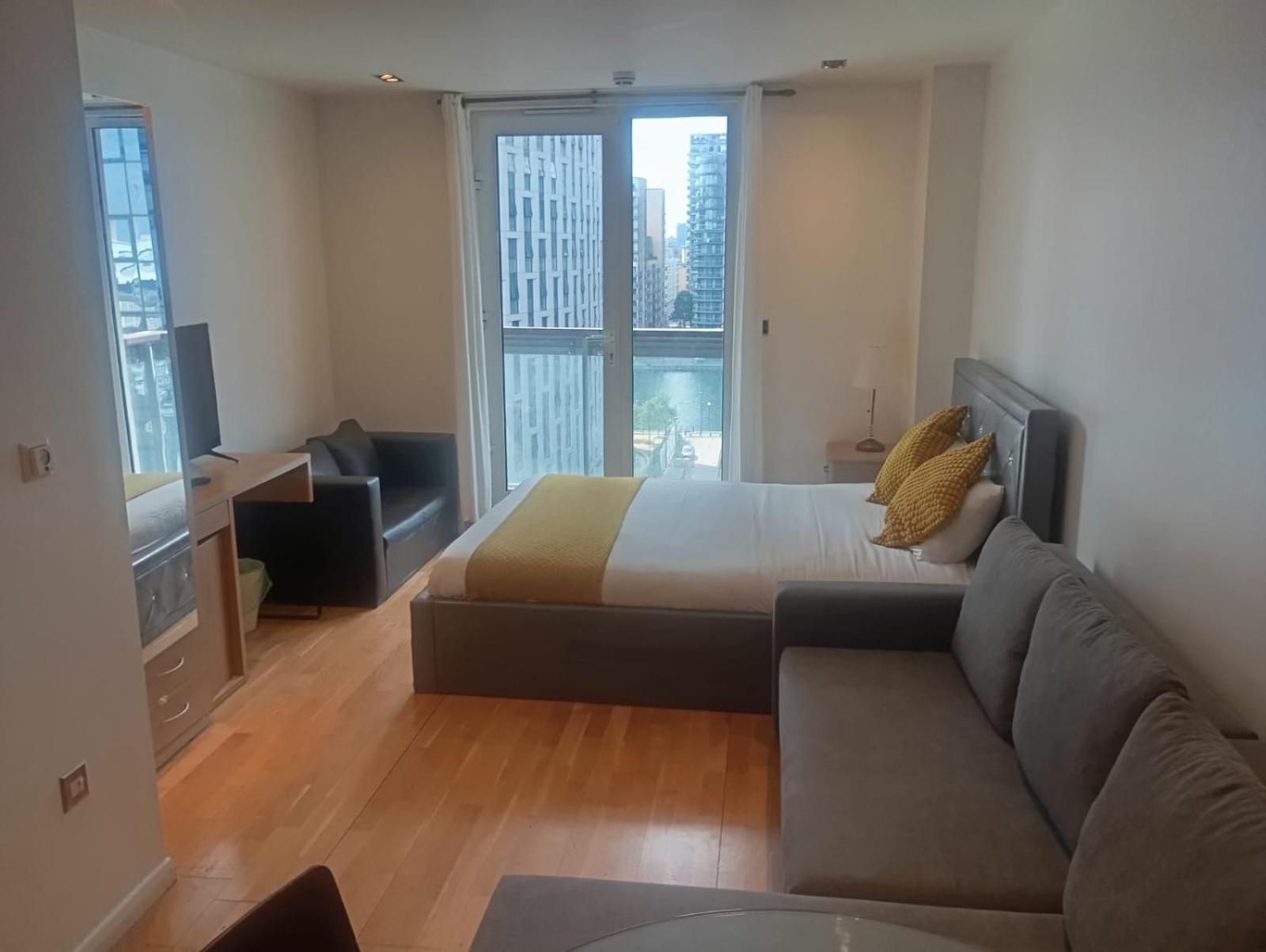 One-Bedroom Apartment with Balcony and City View