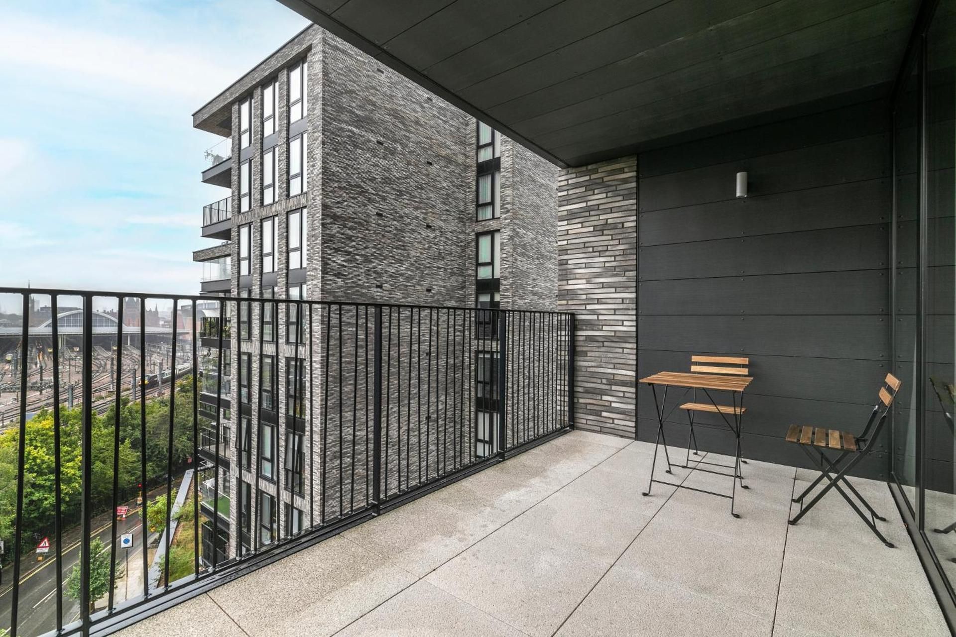 Three-Bedroom Apartment with Balcony
