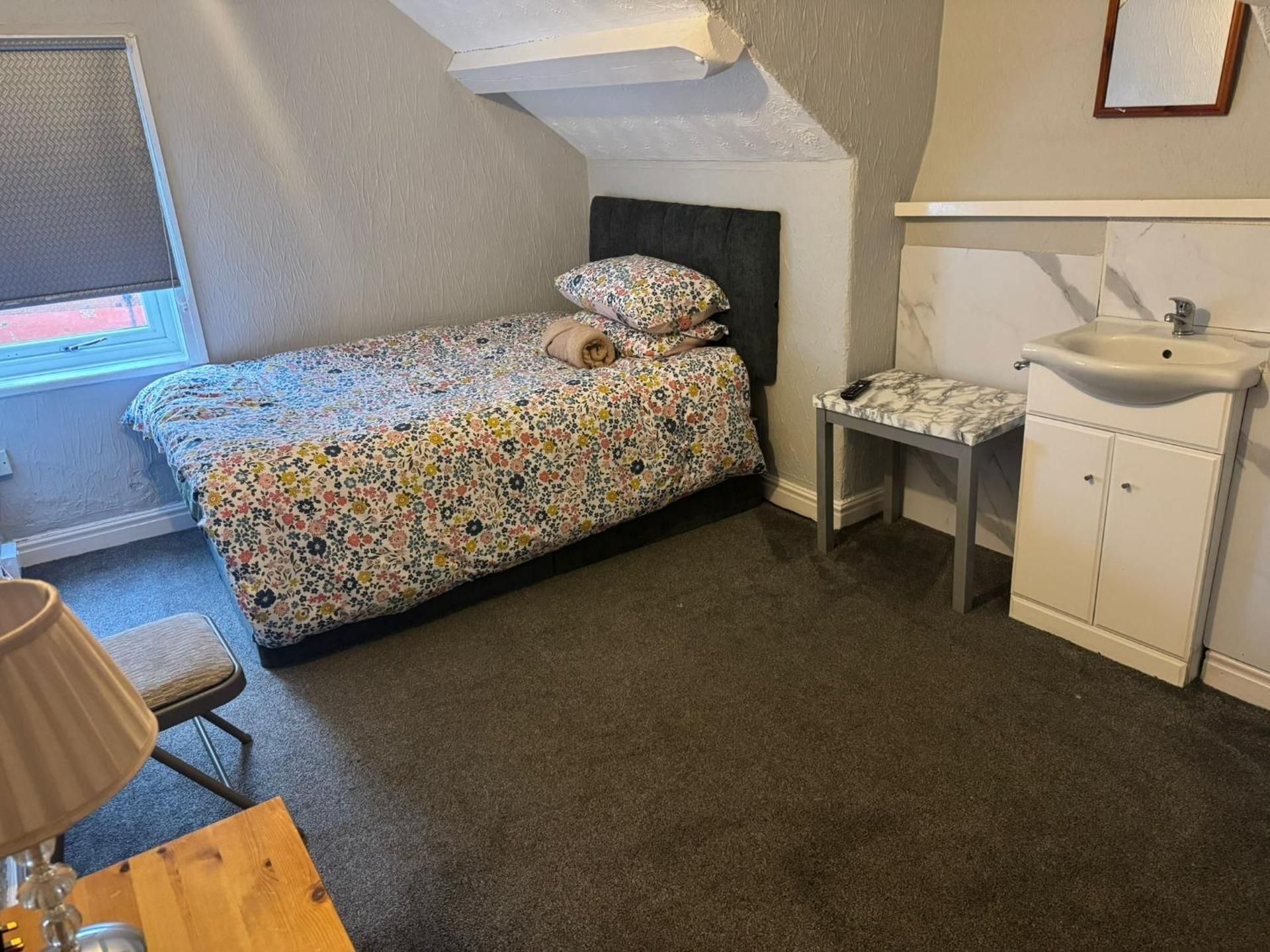 Single Room with Shared Bathroom