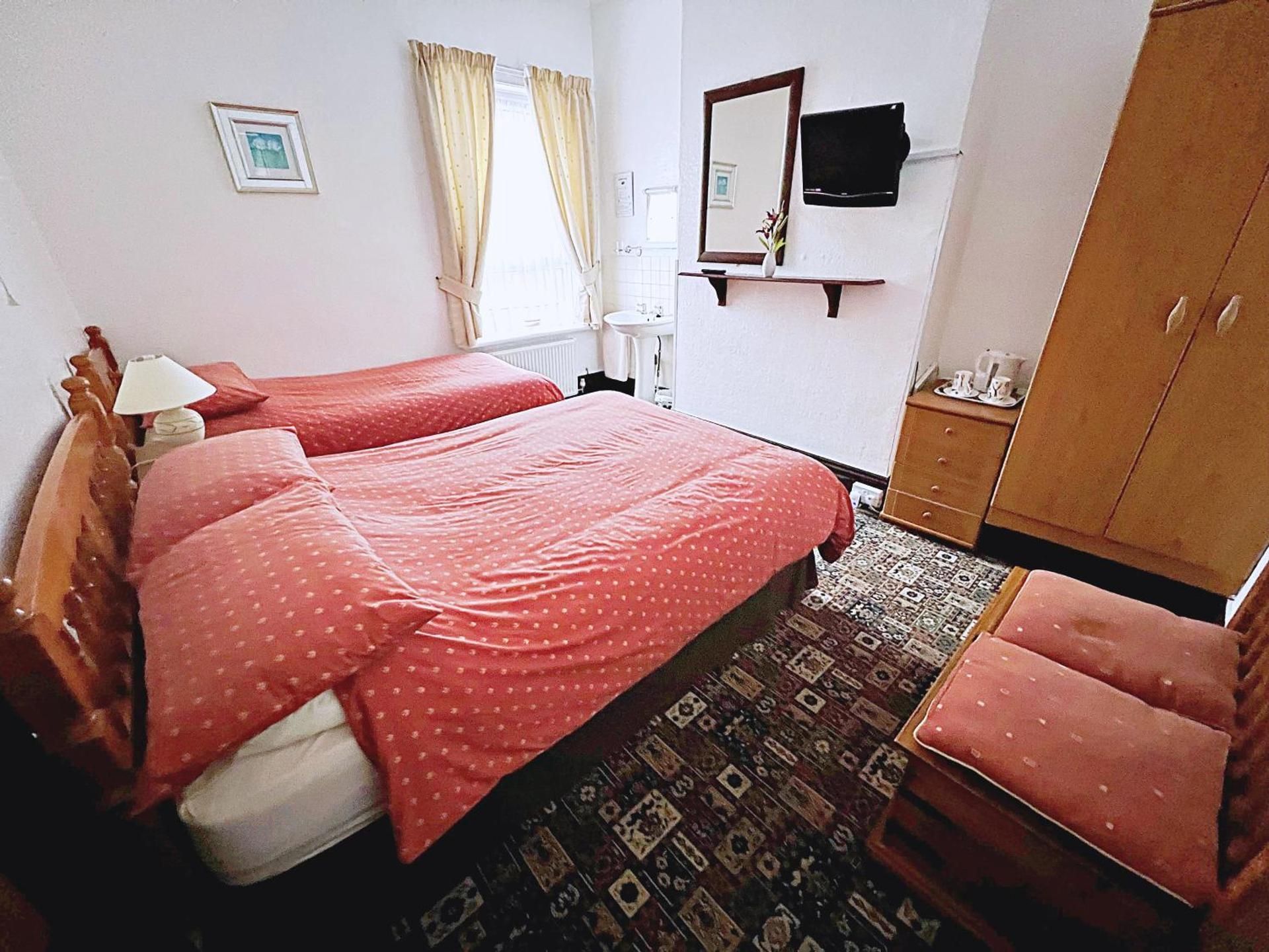 Deluxe Room (2 Adults + 1 Child)