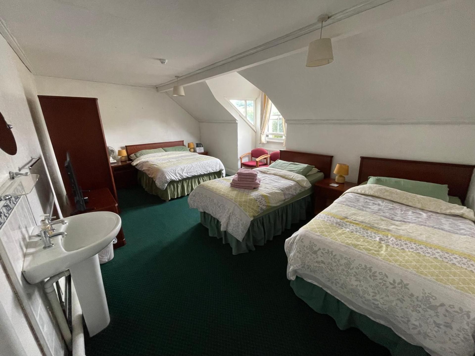 Quadruple Room with Shared Bathroom