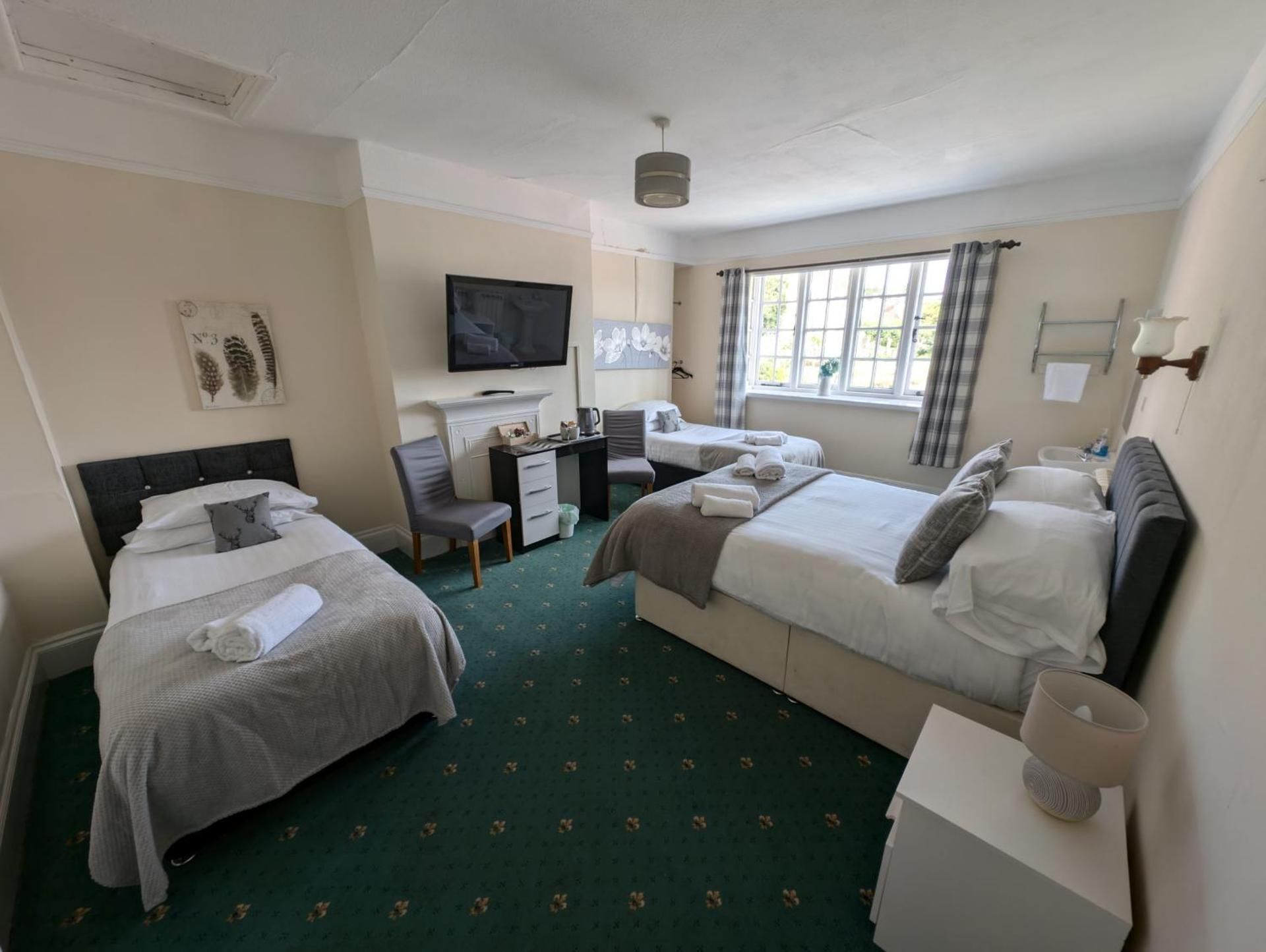 Quadruple Room with Shared Bathroom
