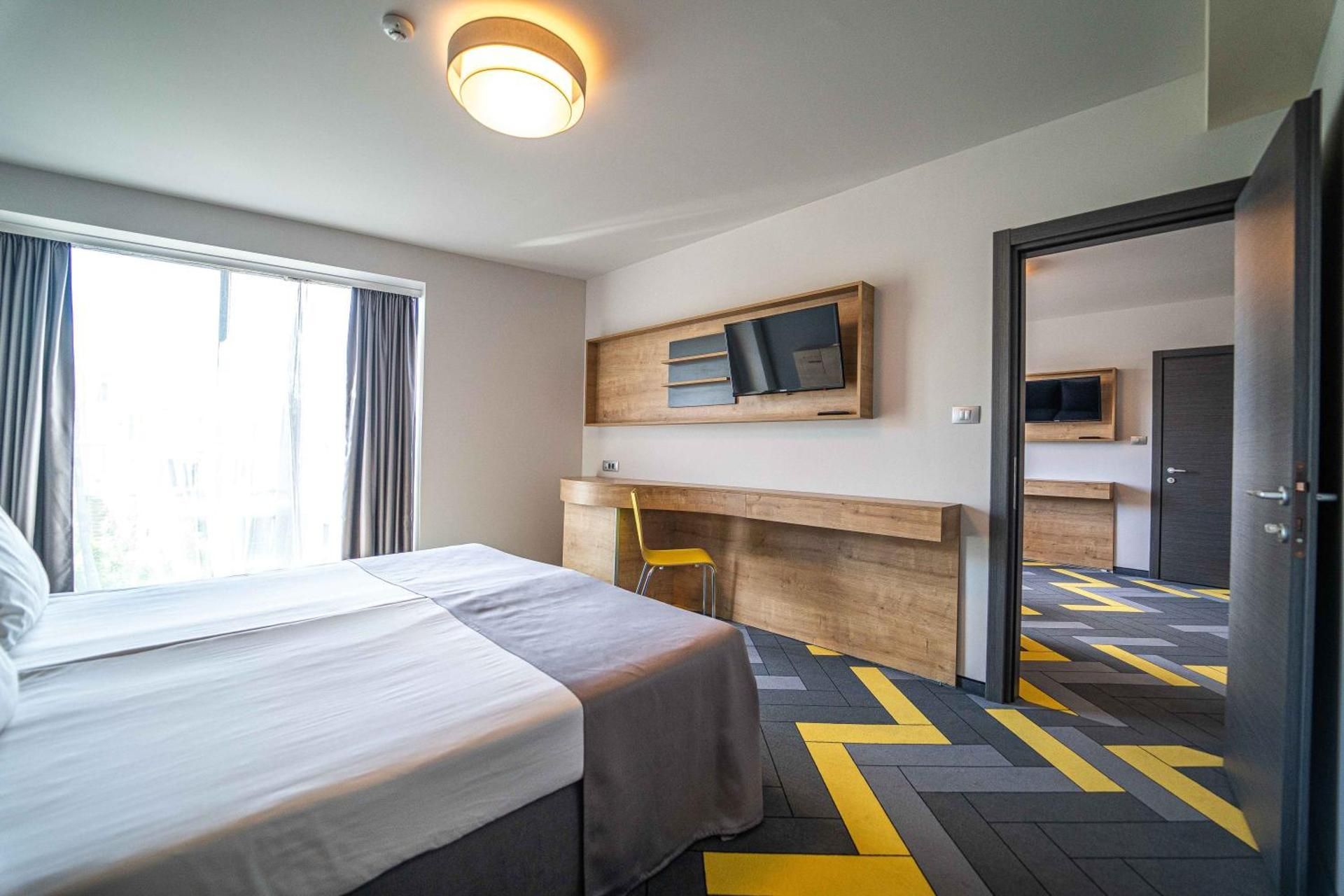 Family Room with Balcony (2 Adults + 2 Children) - Free Mini-bar & Parking
