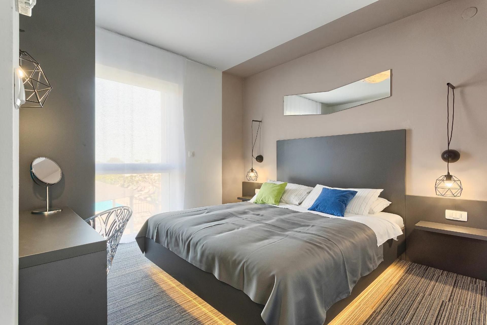One-Bedroom Apartment with Balcony and Sea View