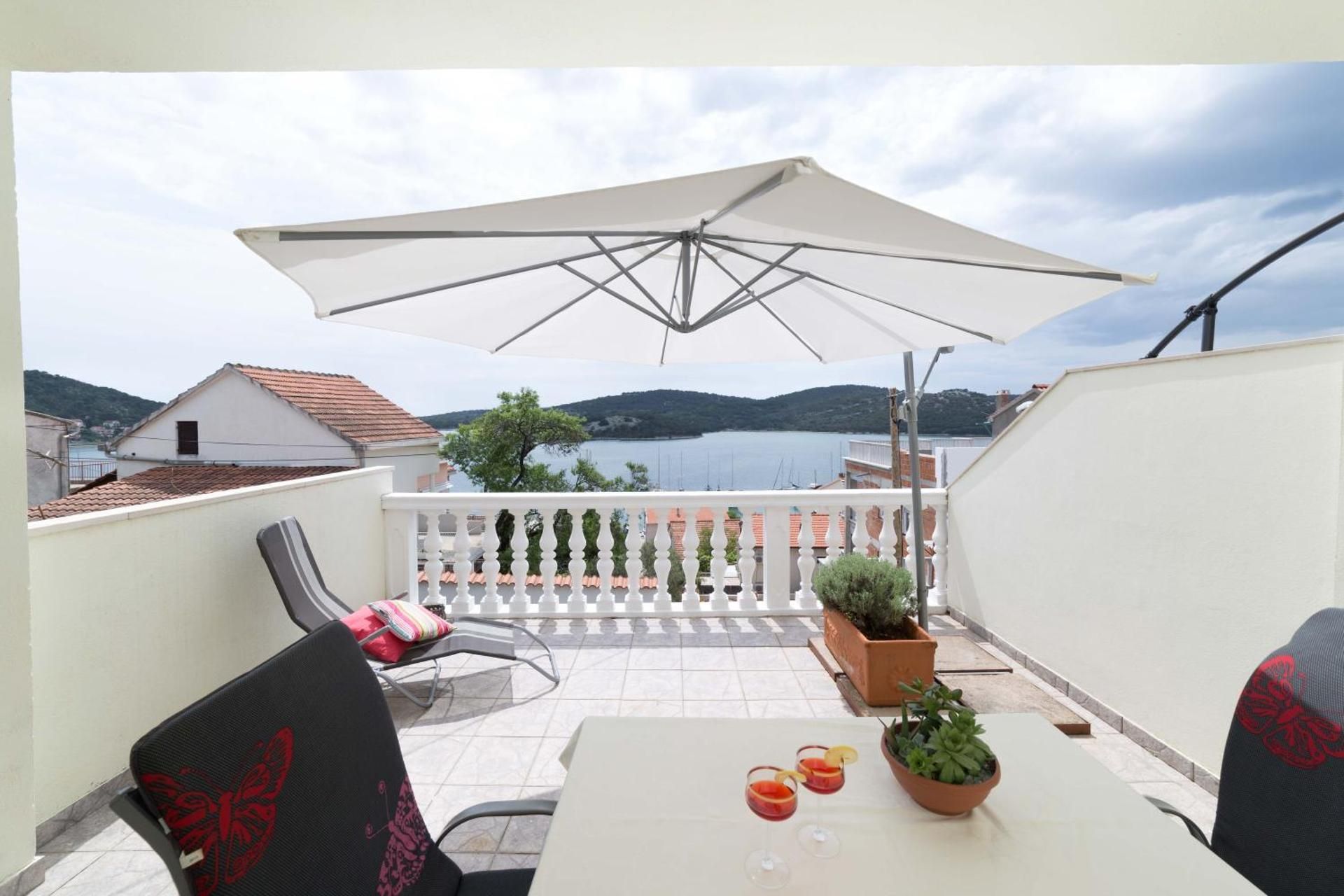 One-Bedroom Apartment with Balcony and Sea View