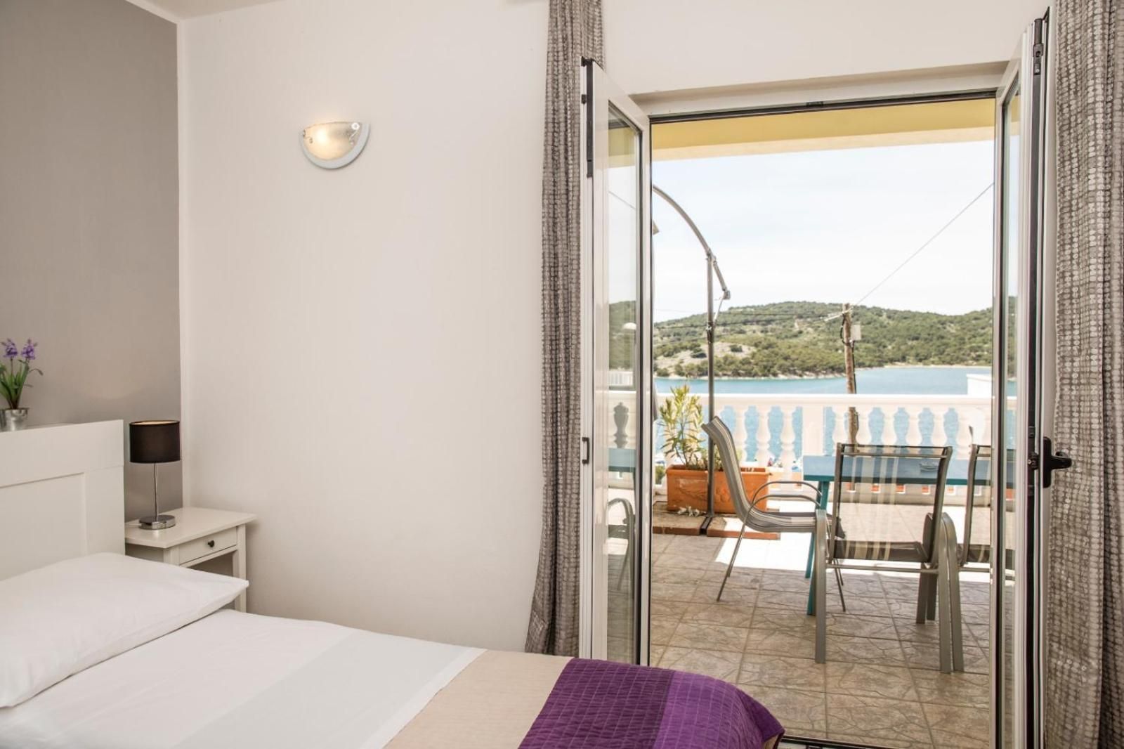 Two-Bedroom Apartment with Balcony and Sea View