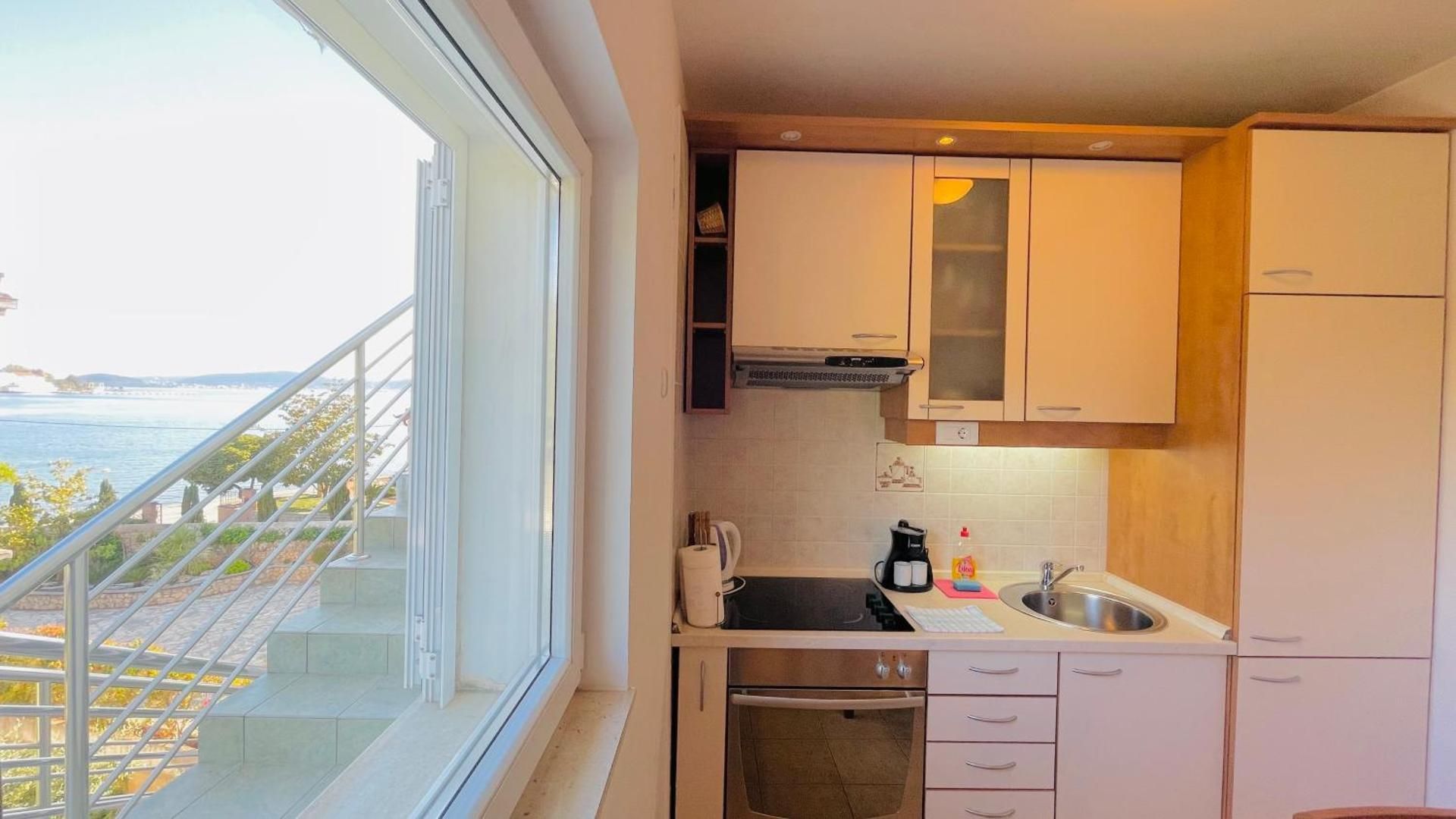 Two-Bedroom Apartment with Balcony and Partial Sea View