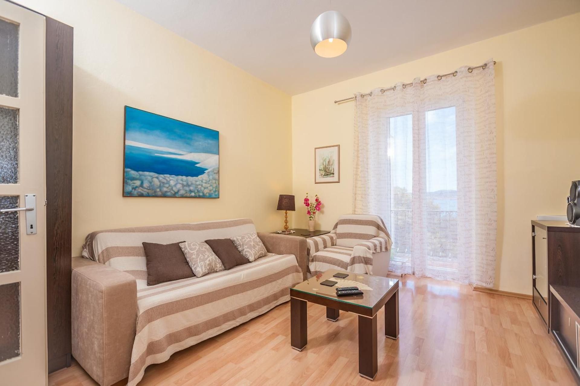 Three-Bedroom Apartment with Balcony and Sea View