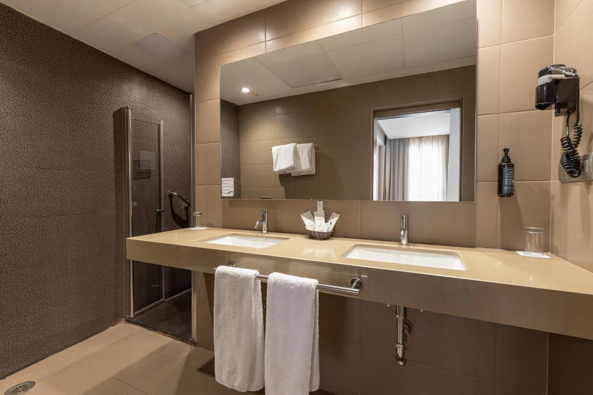 Triple Room (2 Adults + 1 Child)