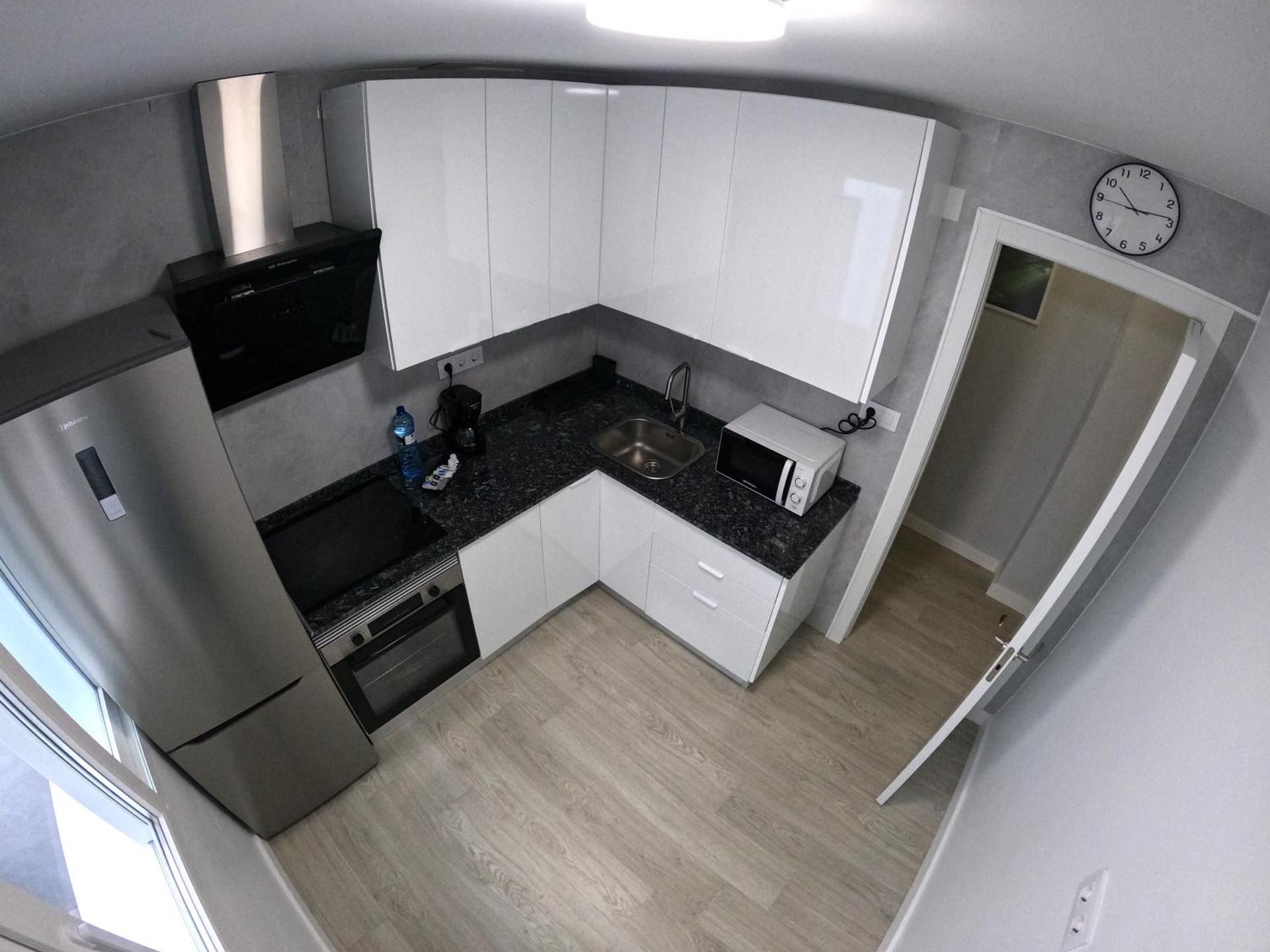 Three-Bedroom Apartment with Balcony
