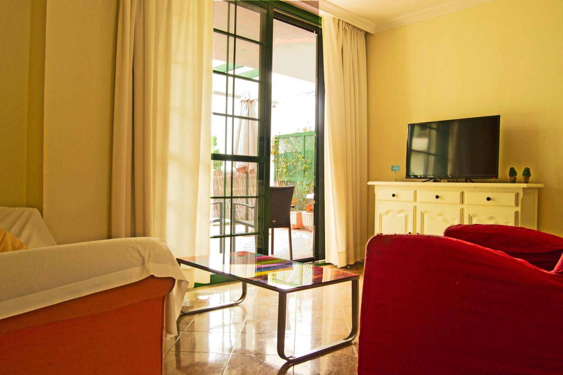 Two-Bedroom Apartment with Private Garden and Swimming Pool access