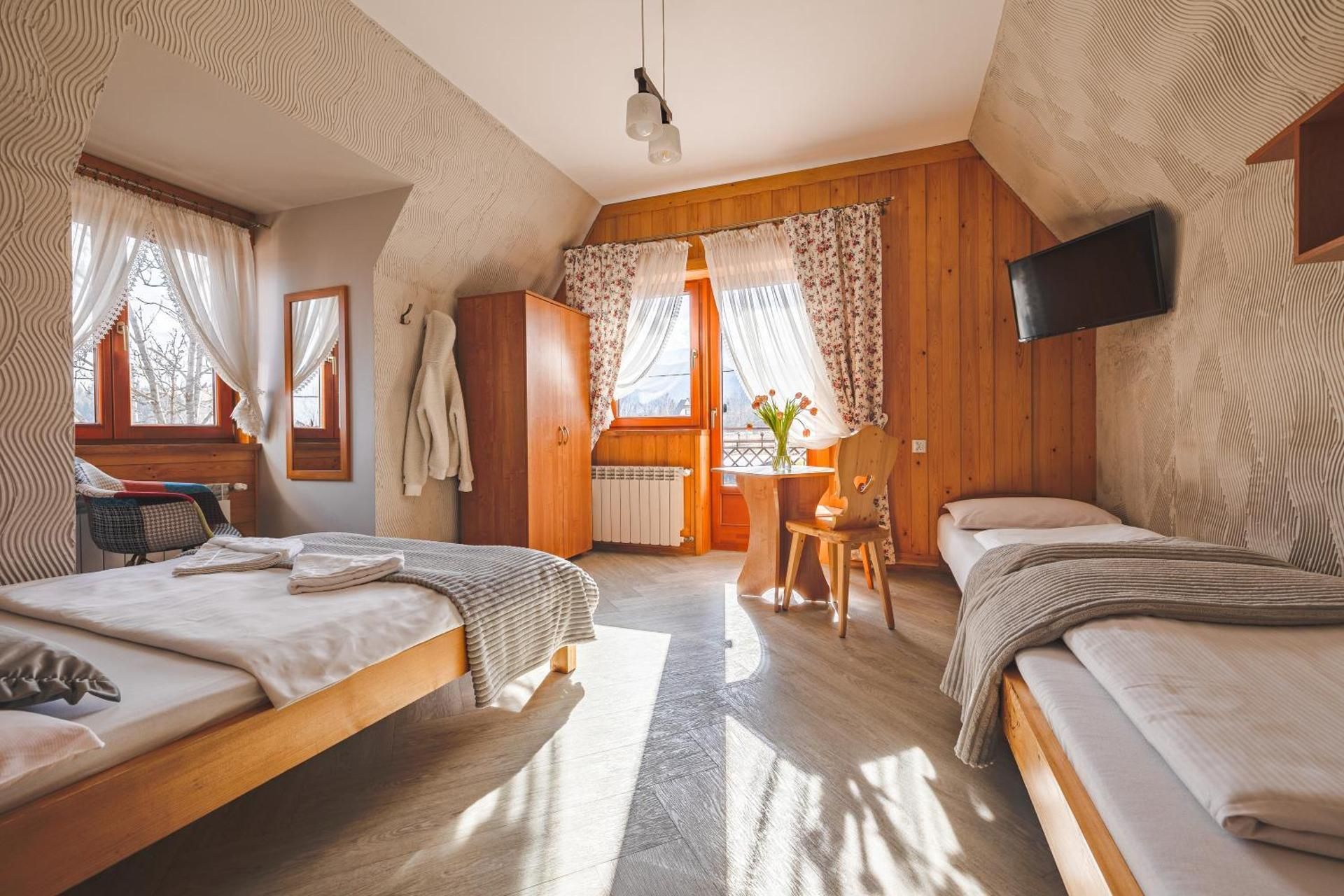Family Room with Balcony and Shared Bathroom