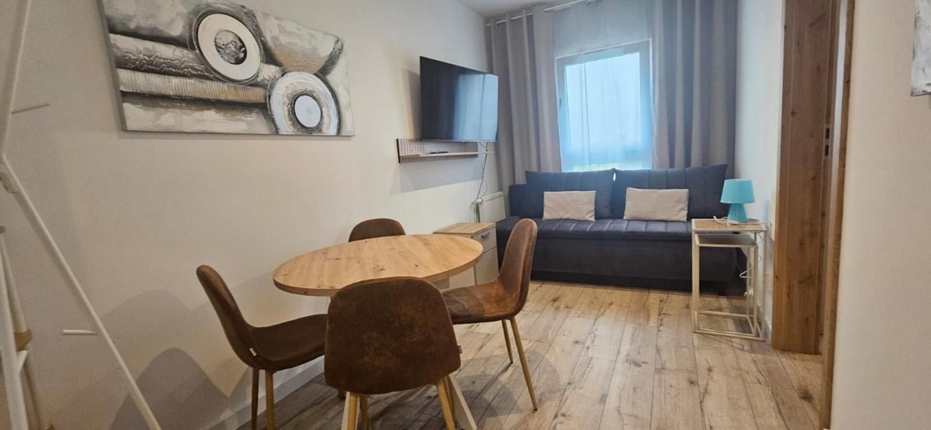 One-Bedroom Apartment with Balcony and City View