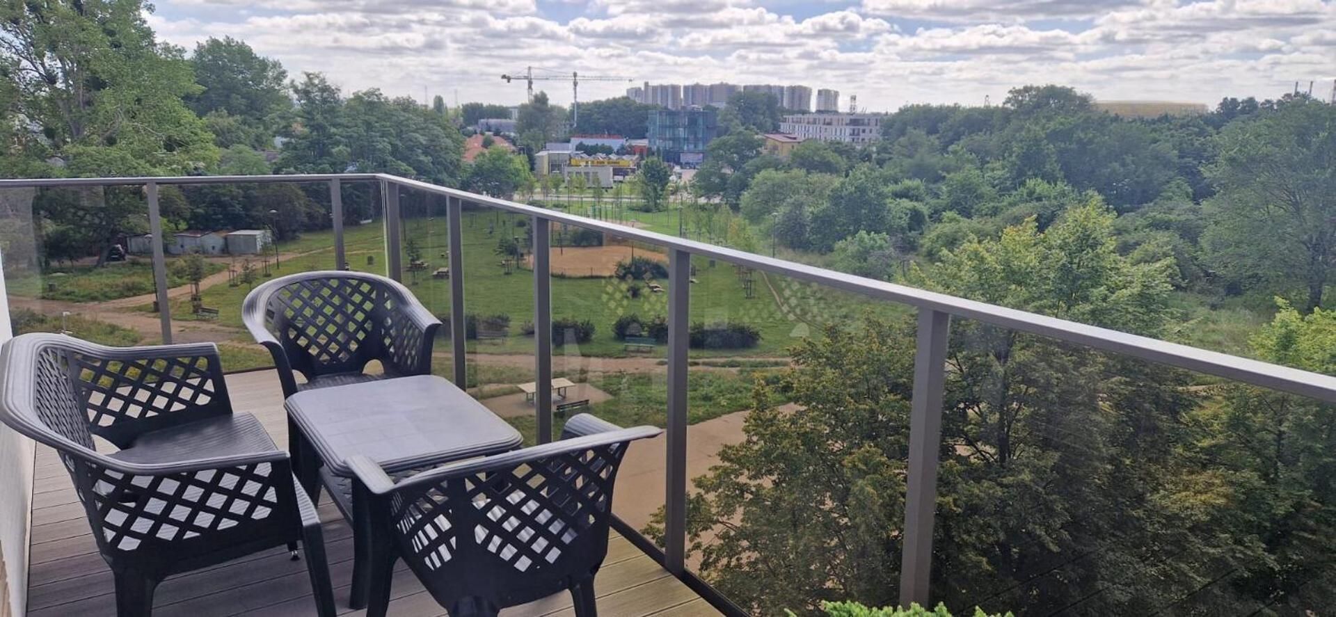 One-Bedroom Apartment with Balcony and City View