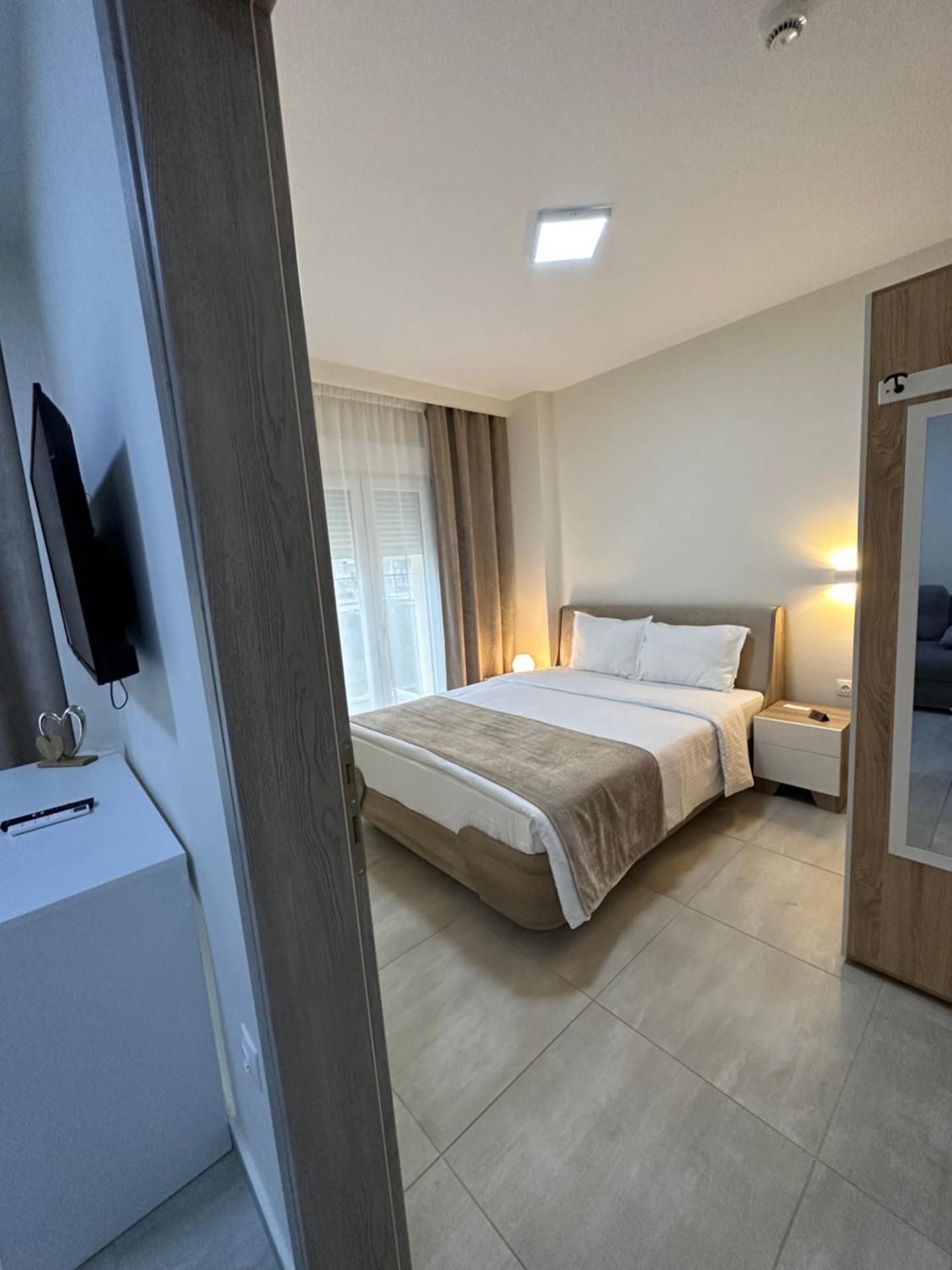 One-Bedroom Apartment with Side Sea View