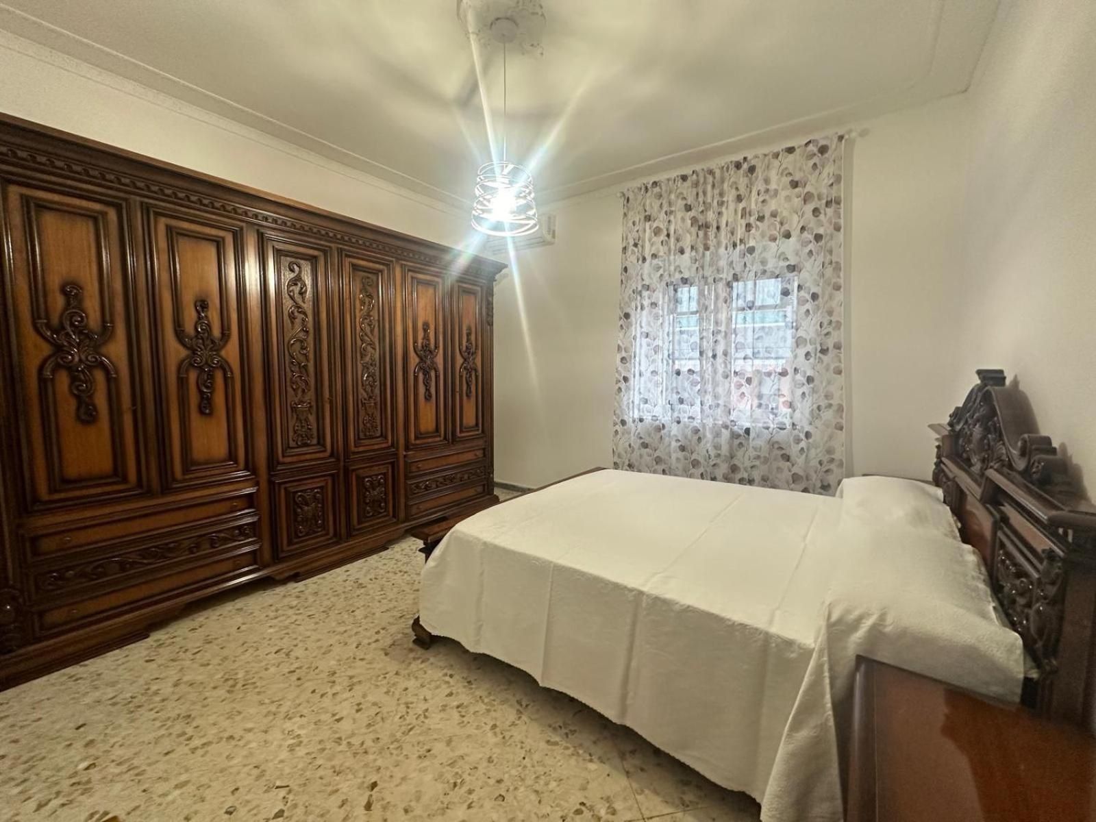 Queen Room with Shared Bathroom