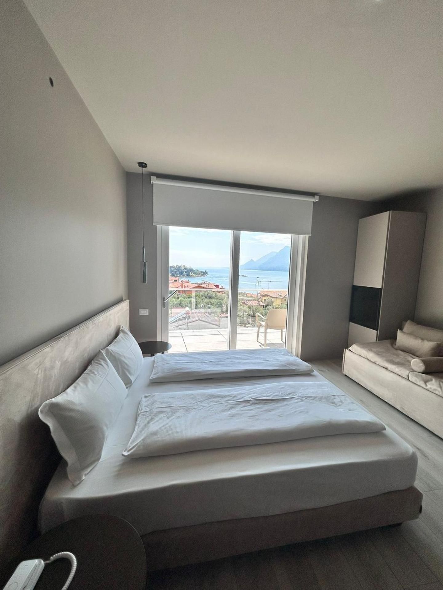Junior Suite with Balcony and Partial Lake View