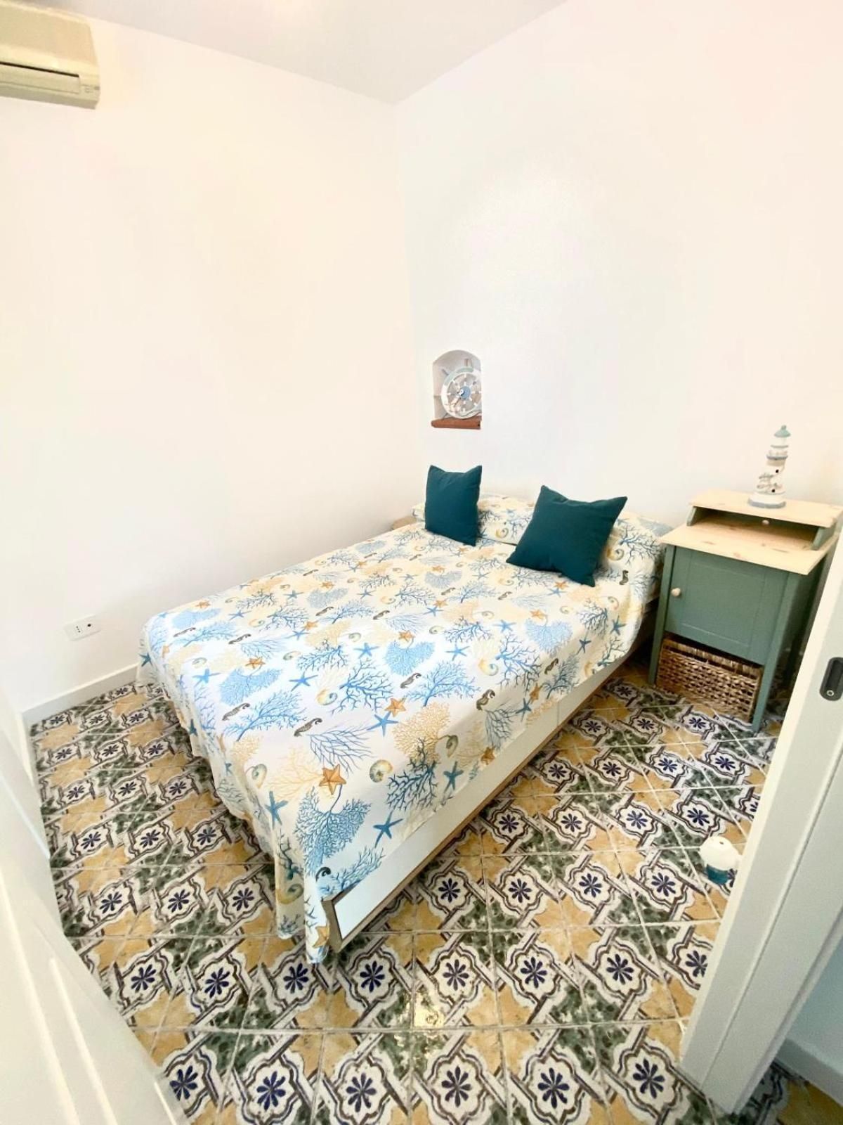 La Perla del Porto di Maratea House Deluxe Quadruple Room