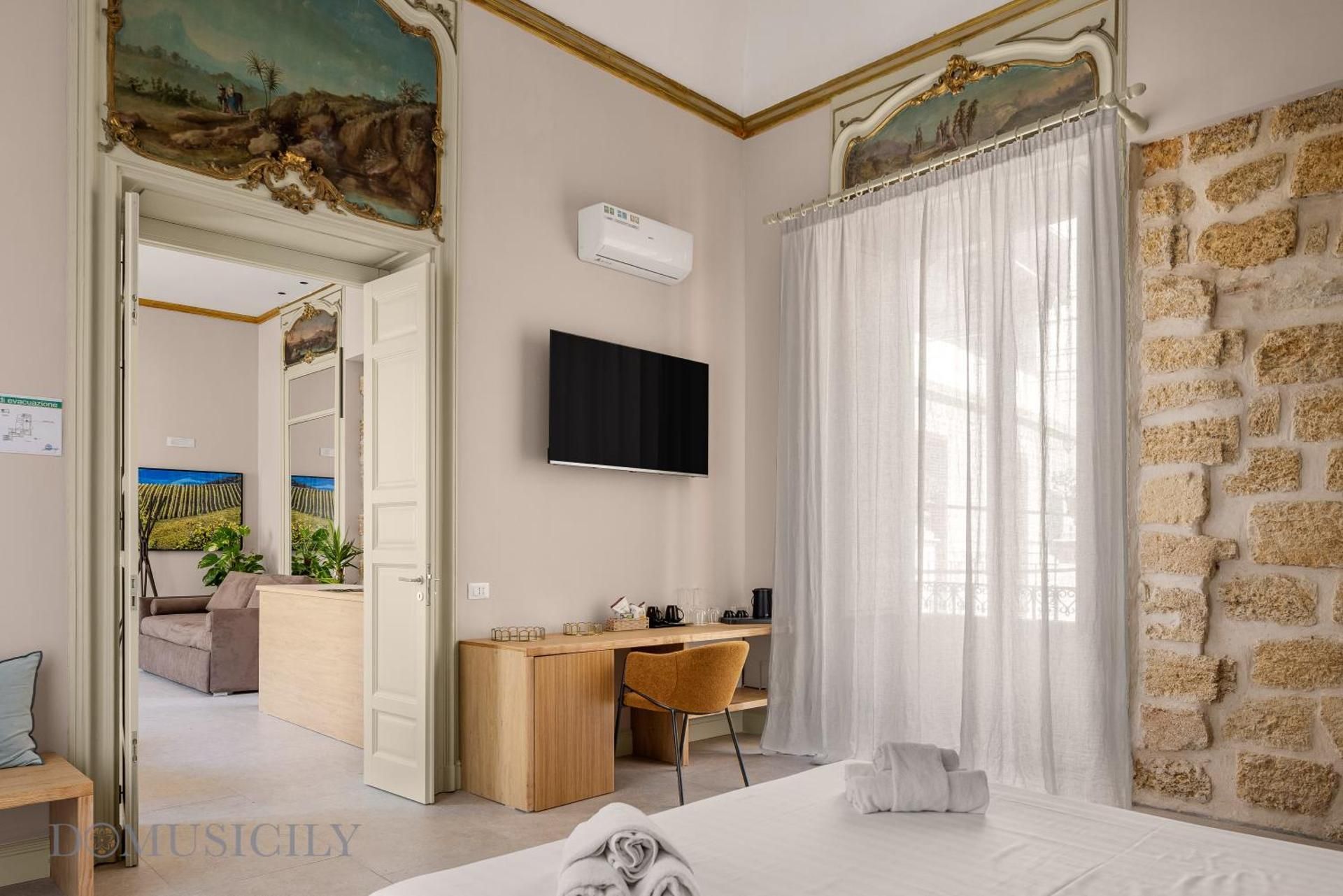 Quadruple Room with Balcony