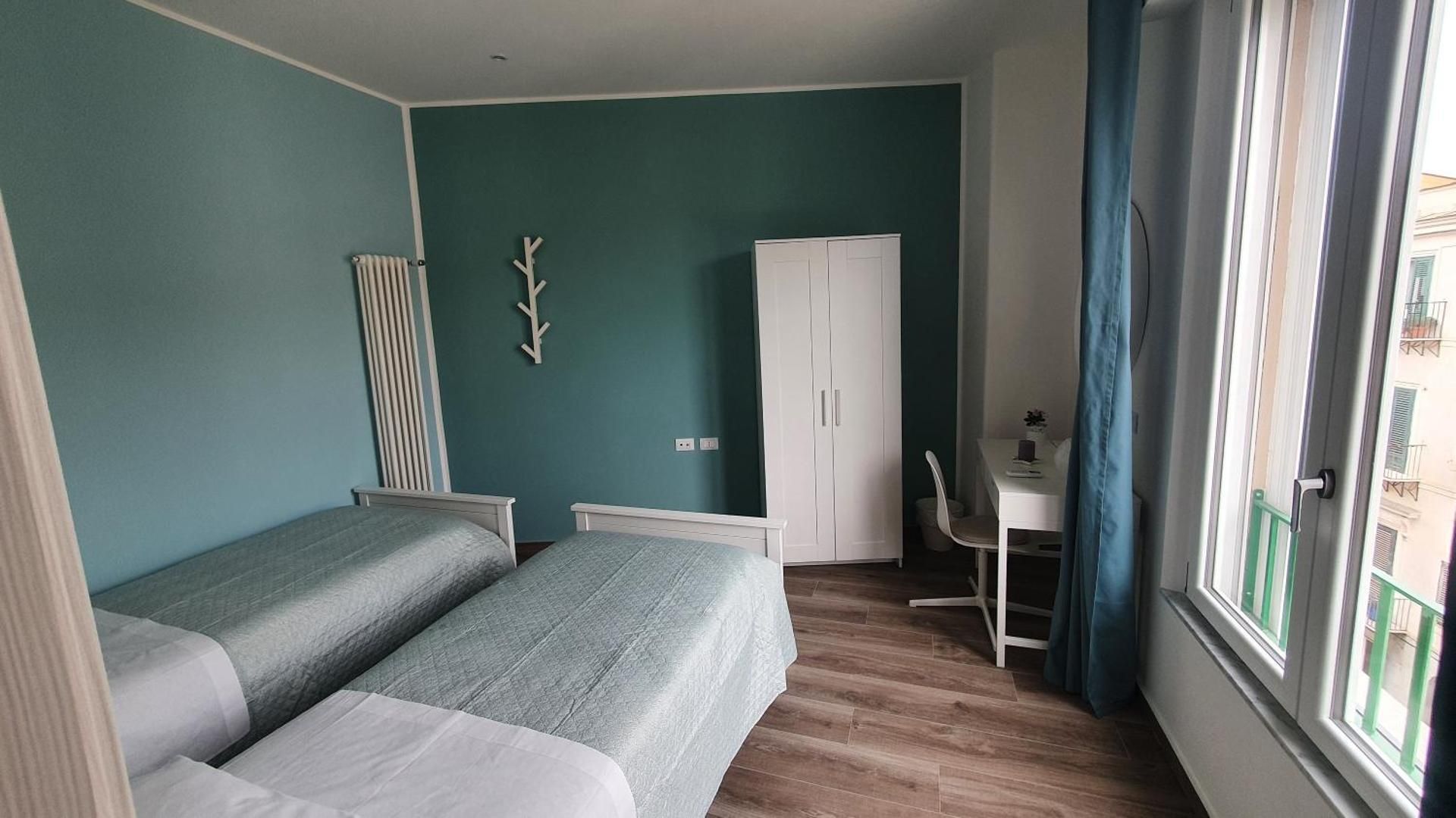 Quadruple Room with Private Bathroom