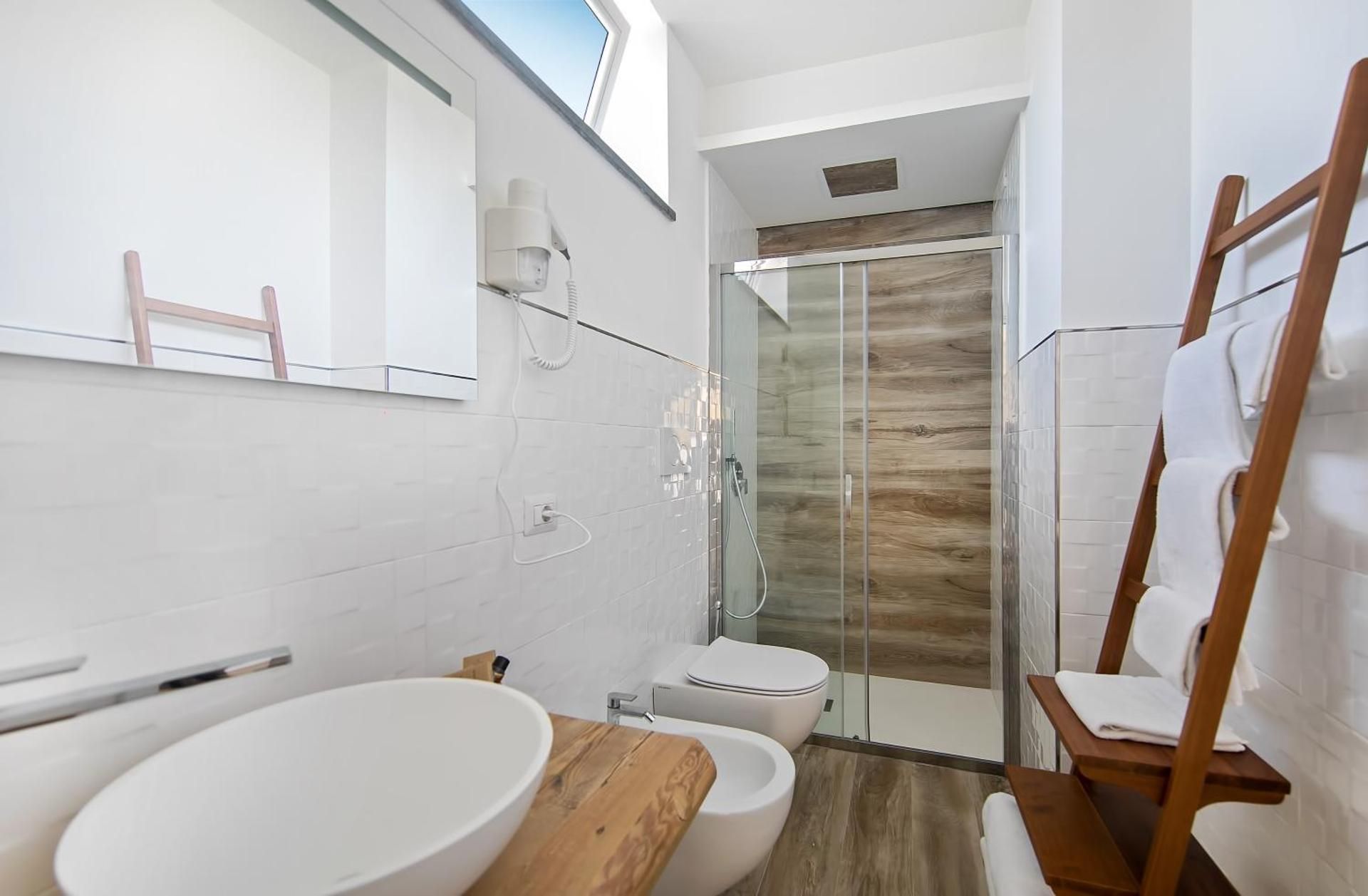 Casa Cristina Deluxe Triple Room 3