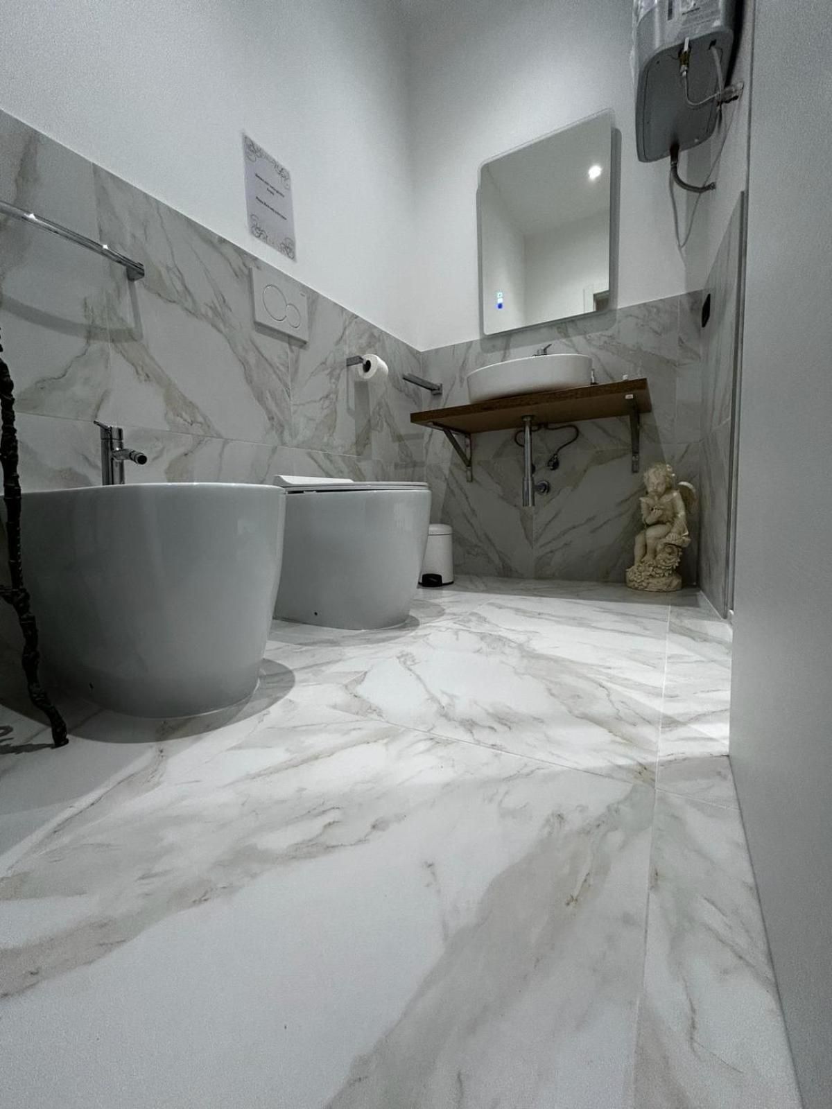 Quadruple Room with Private Bathroom