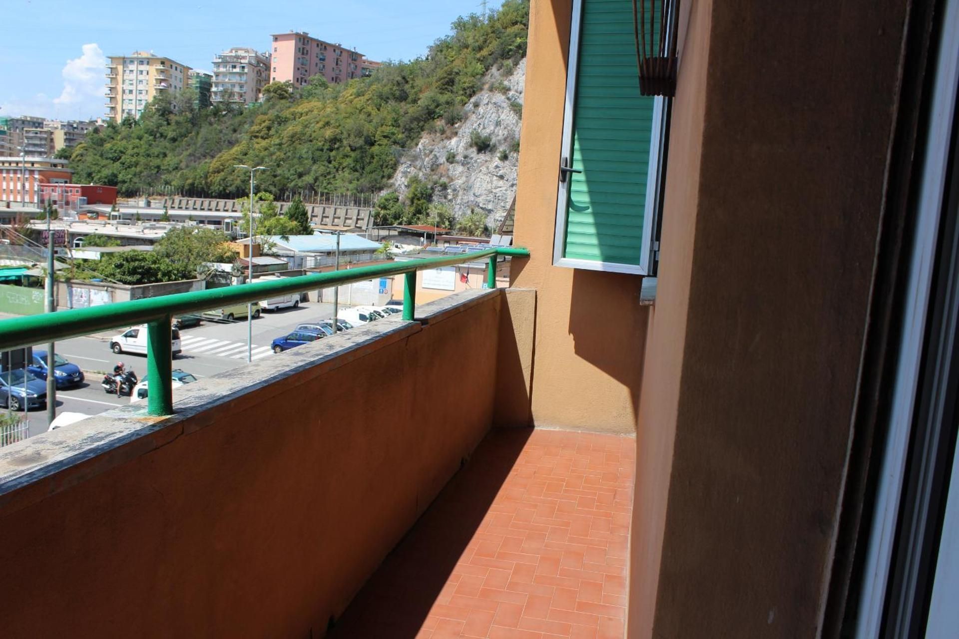 Three-Bedroom Apartment with Balcony