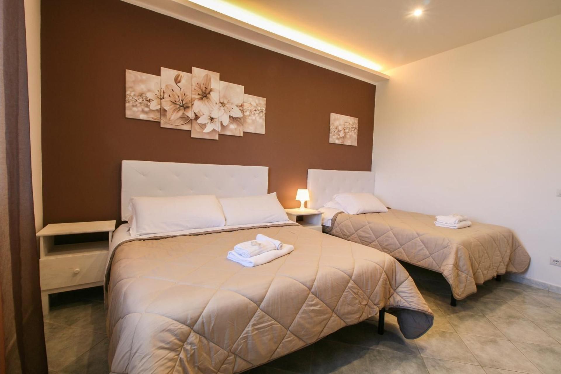 Quadruple Room with Private Bathroom