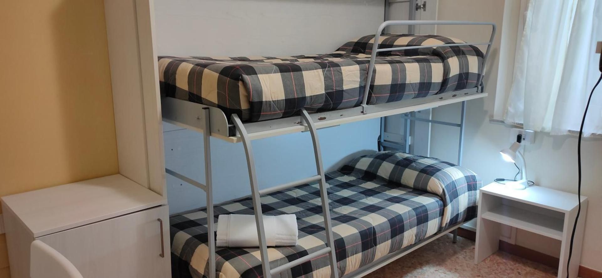 Two Connecting Rooms with Hill View