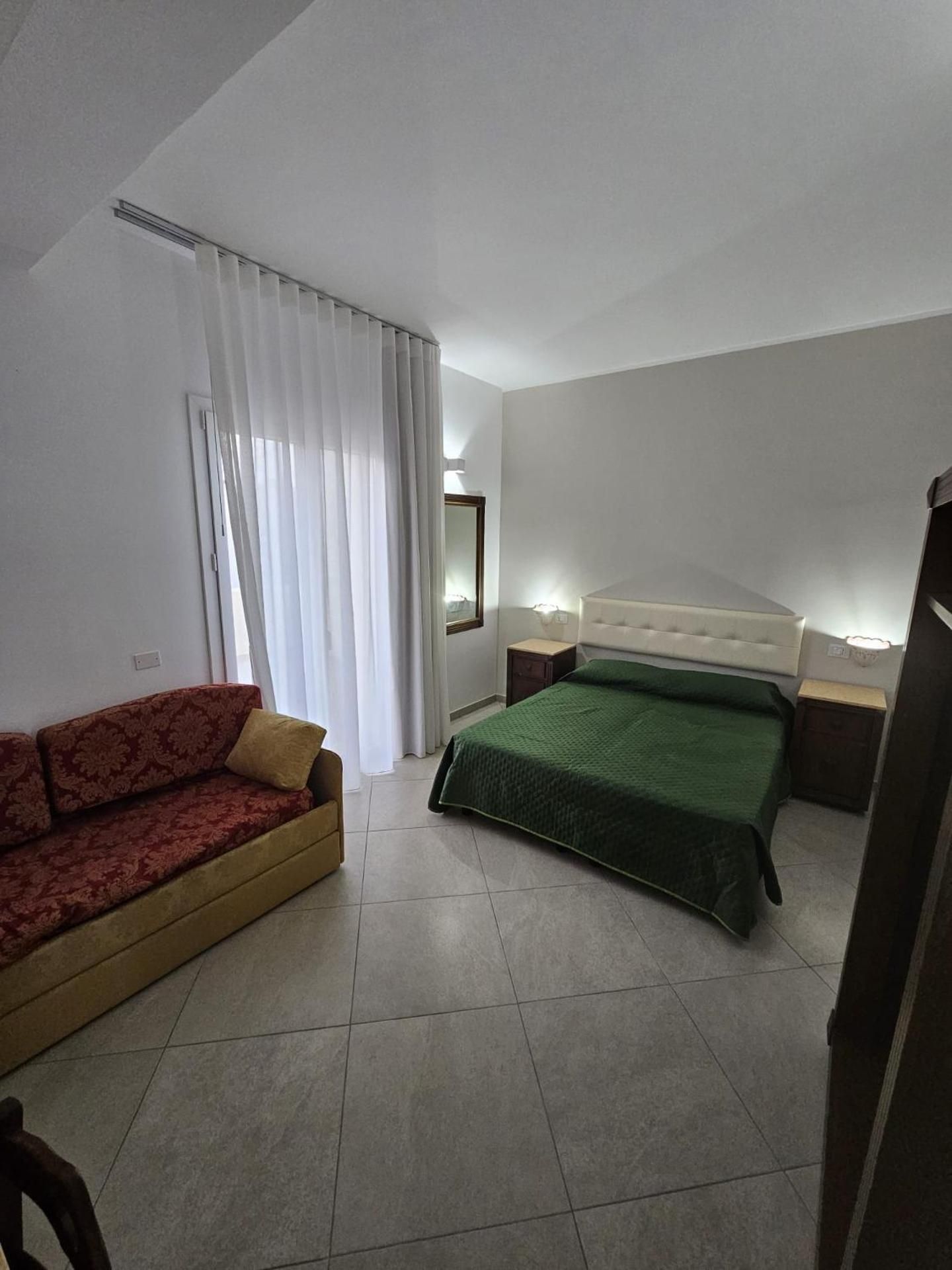Quadruple Room with Private Bathroom