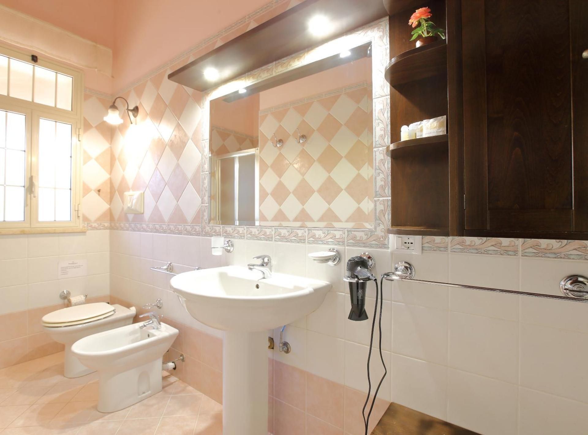 Quadruple Room with Private Bathroom
