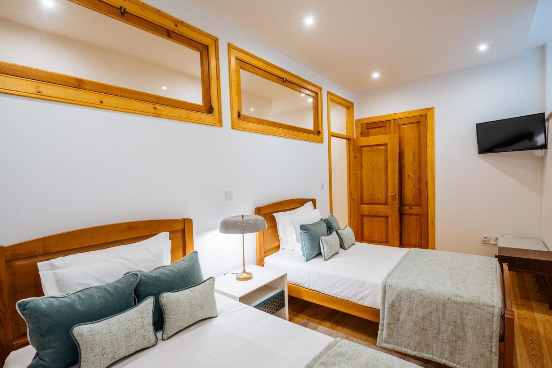 Interior Twin Room with Shared Bathroom - No Window