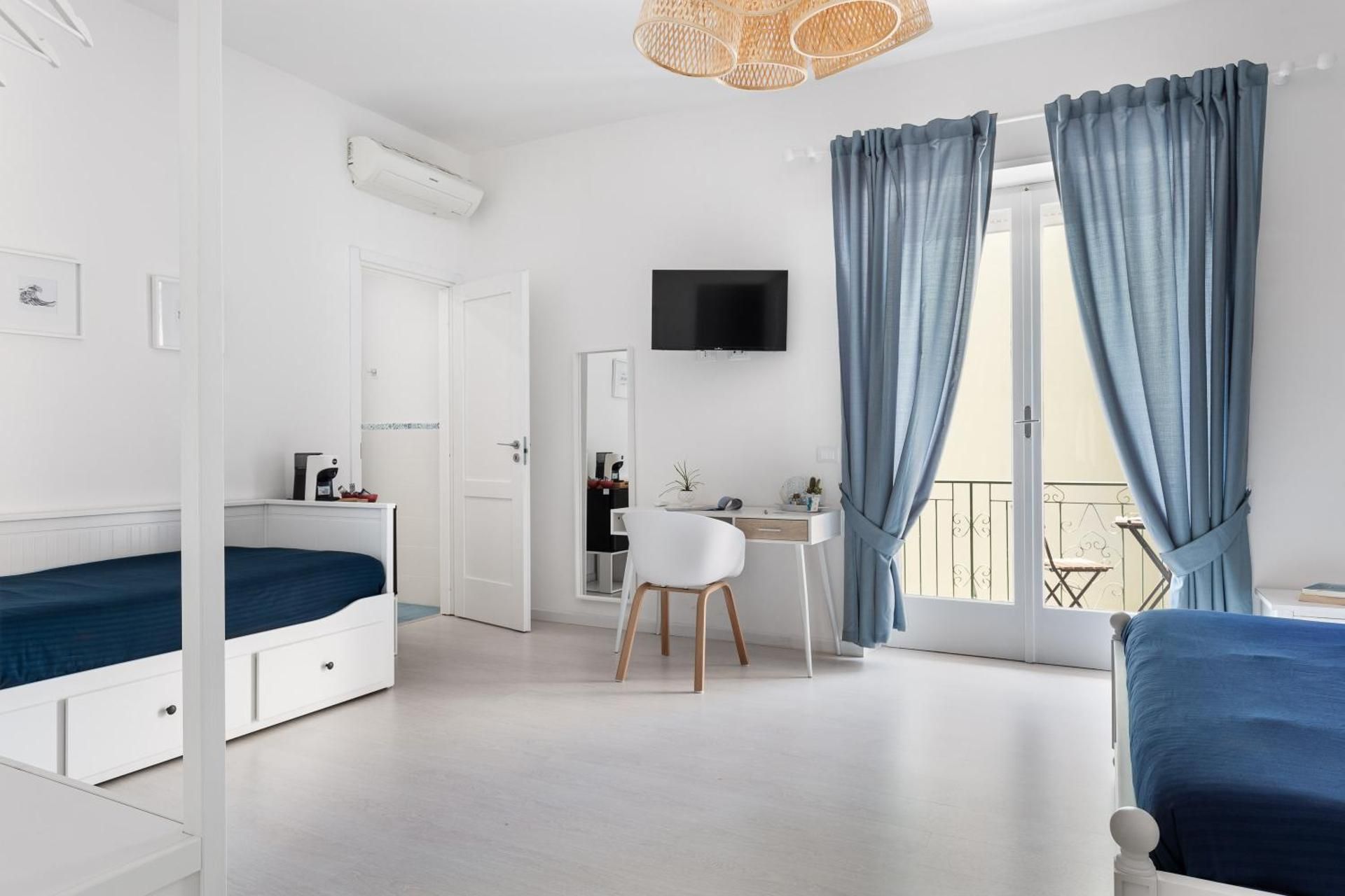 Quadruple Room with Balcony