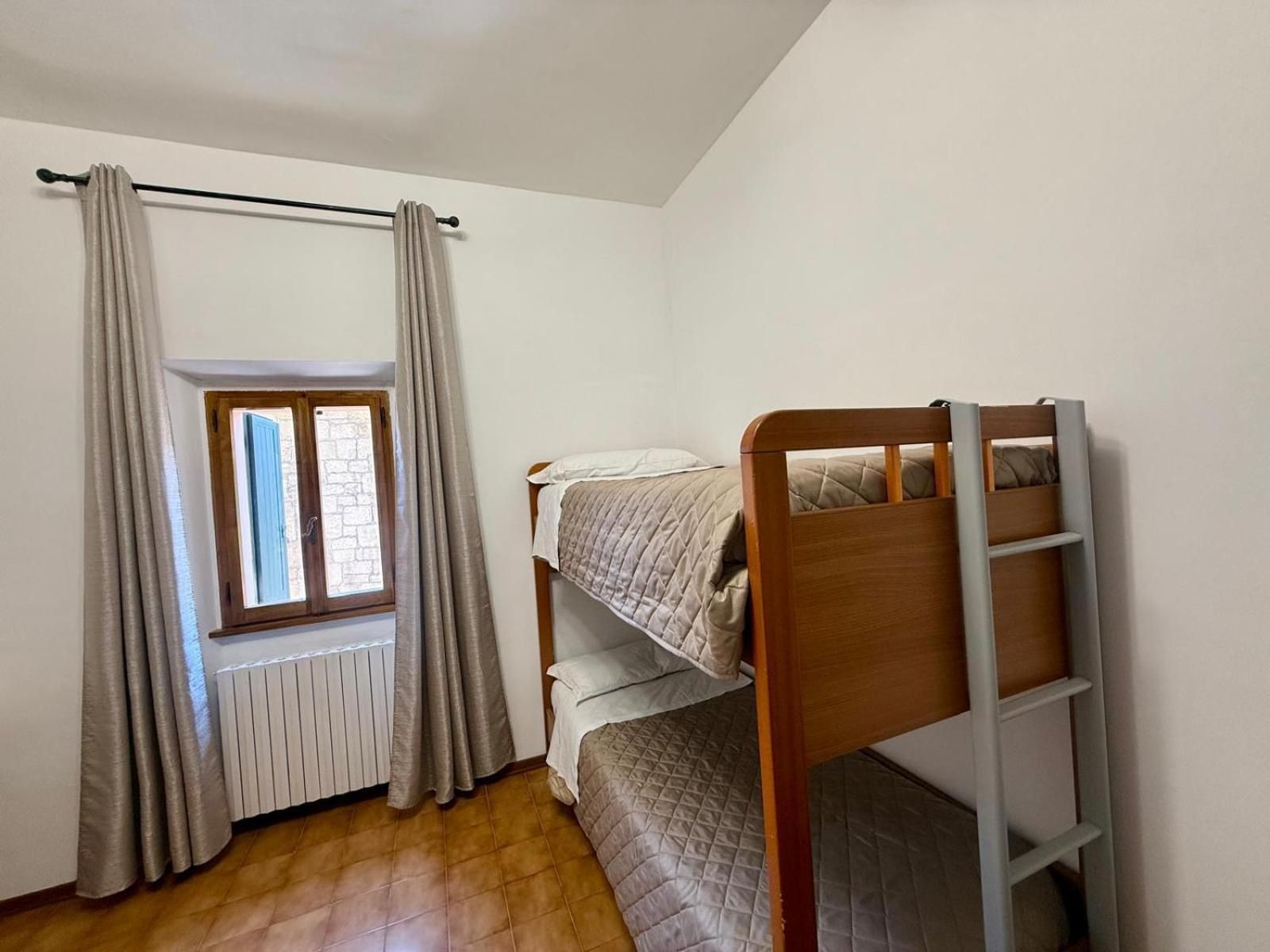 Quadruple Room with Private Bathroom