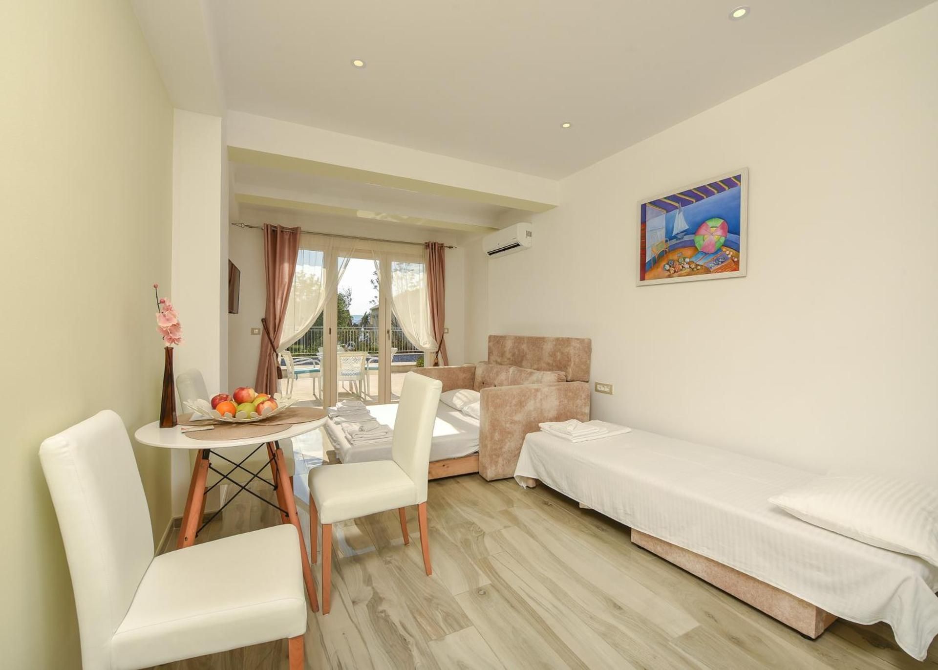 Studio with Terrace and Pool view (3 Adults)