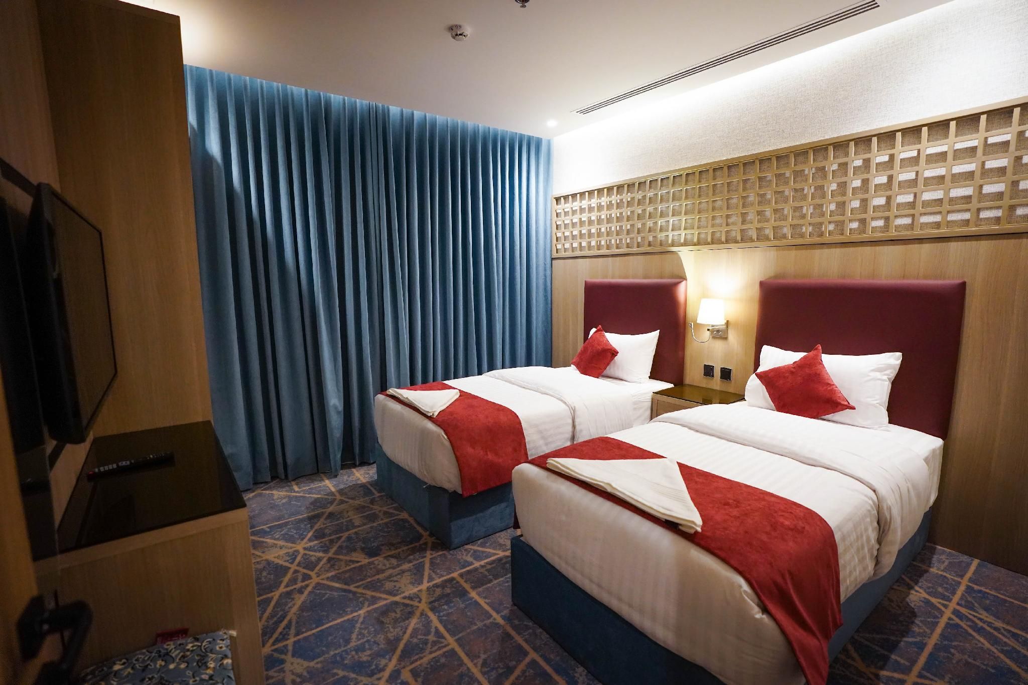 Standard Quadruple Room with Bathtub