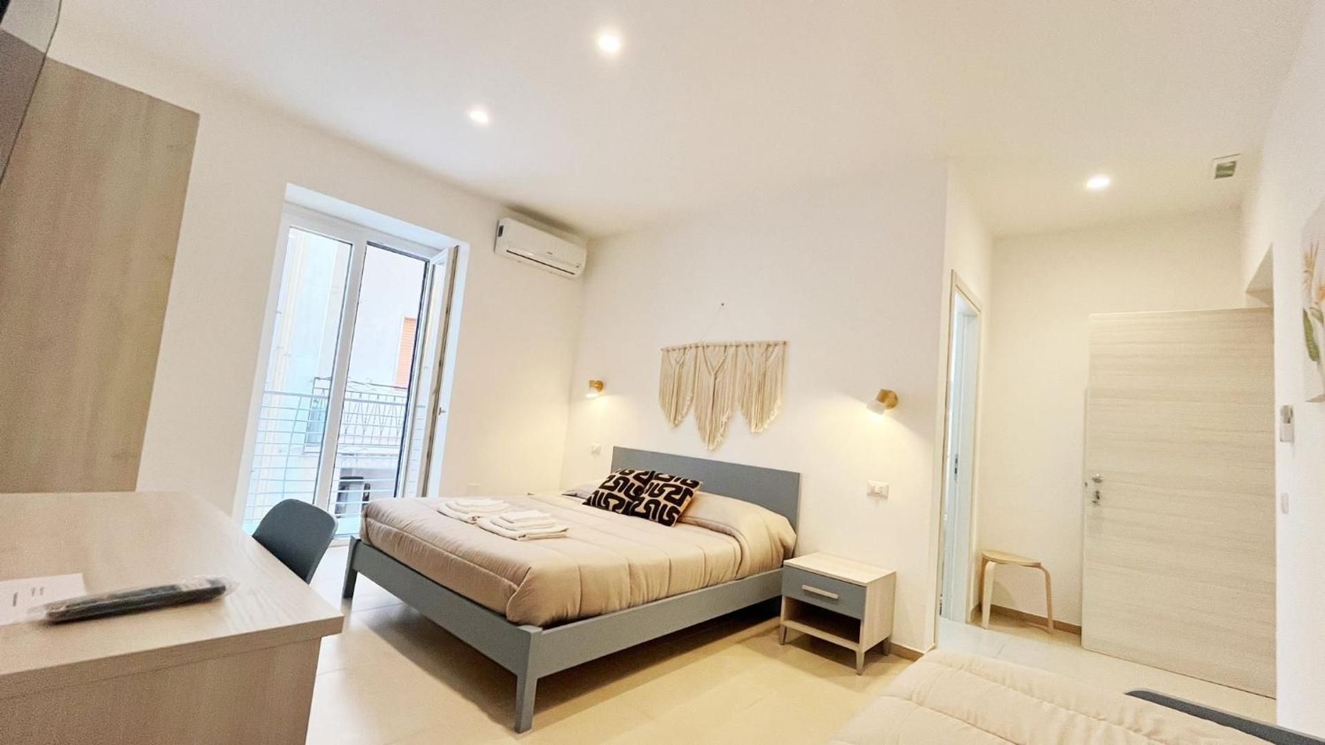 Quadruple Room with Balcony