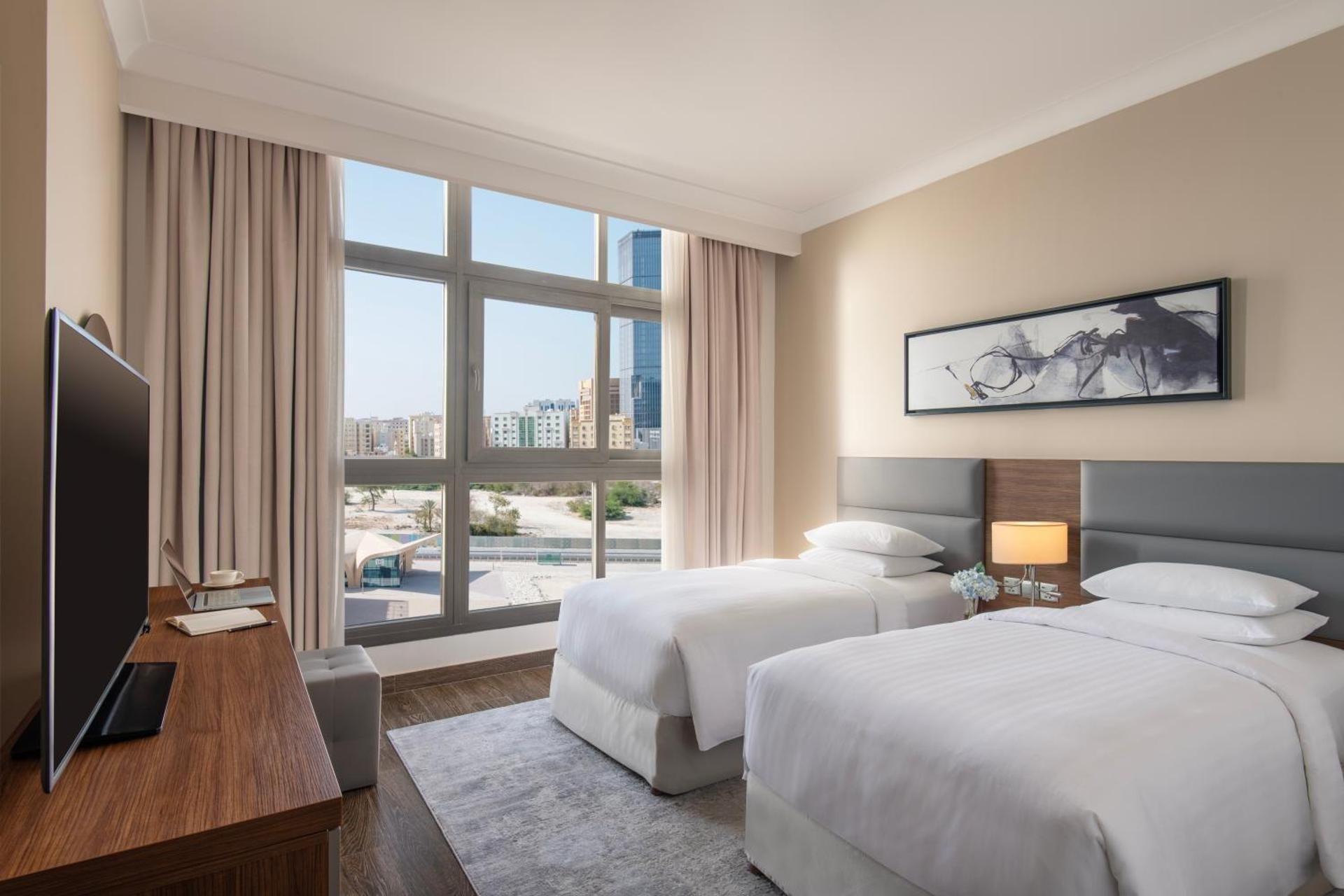 Two-Bedroom Duplex Apartment with Balcony and City View